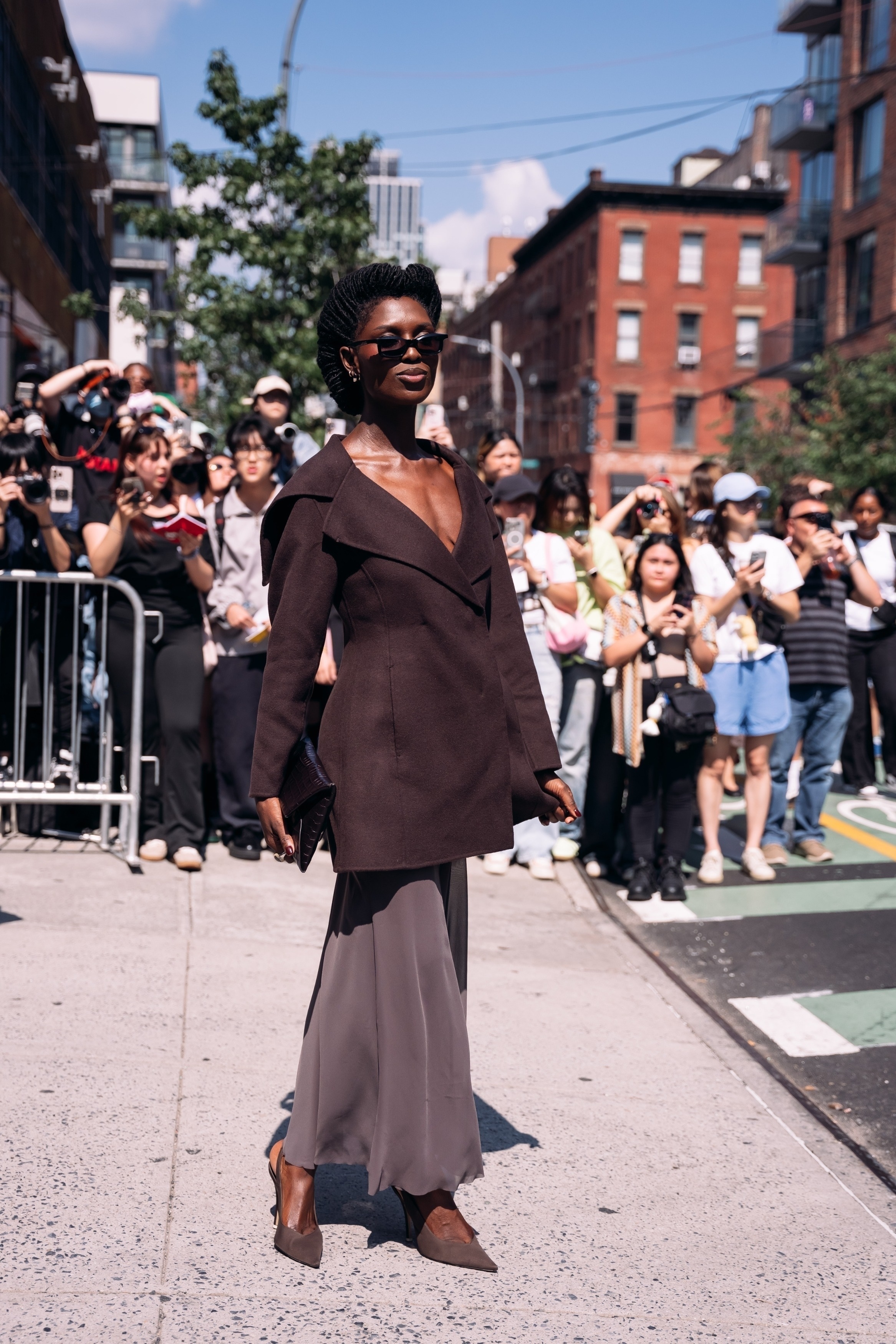 Jodie Comer-Smith wears an all brown outfit in New York.