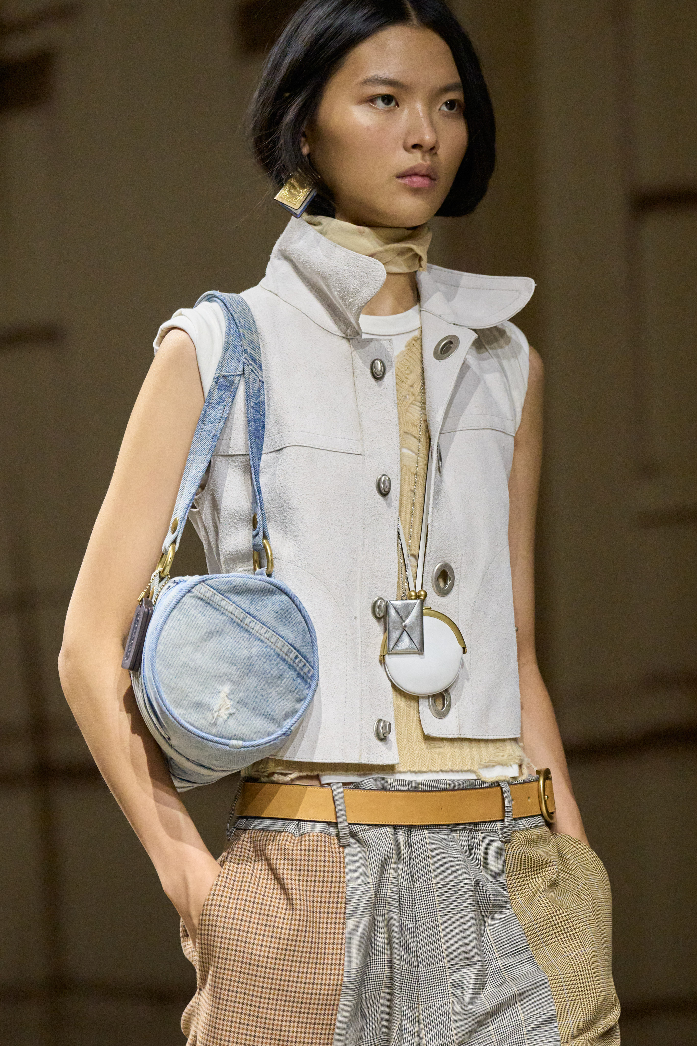 Coach S/S 26 runway, one-earring trend