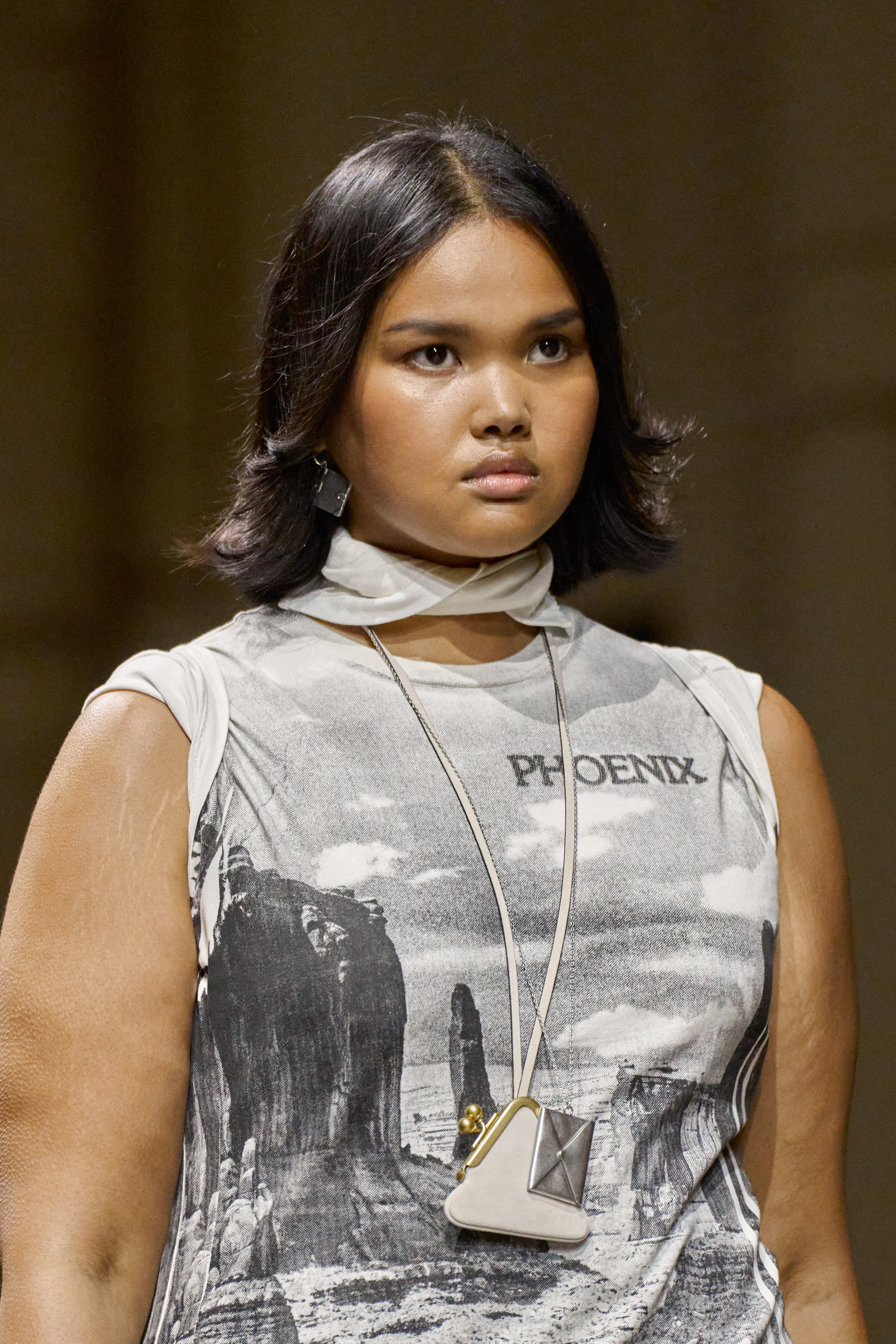 Coach S/S 26 runway, one-earring trend