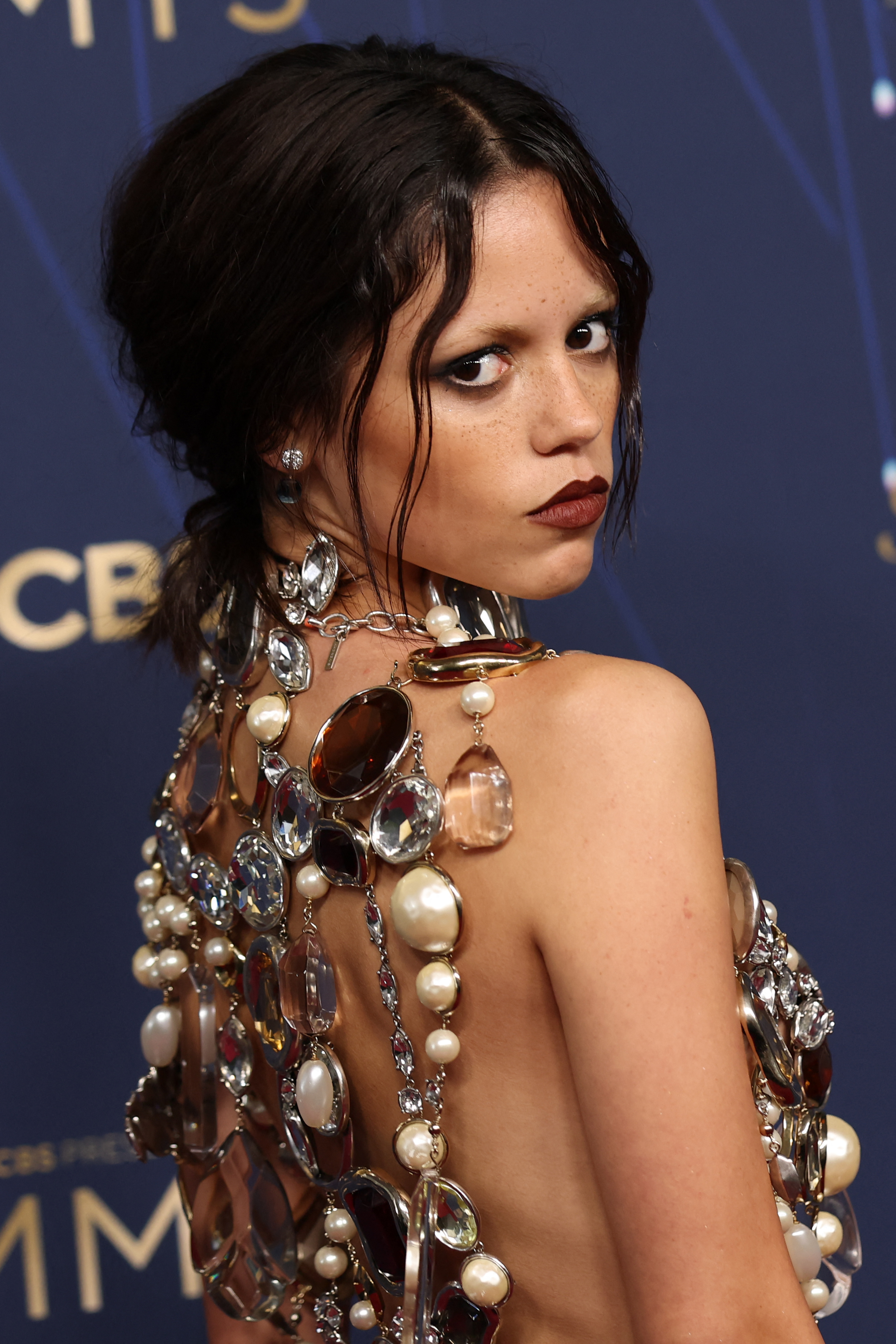 Jenna Ortega arrives for the 77th Primetime Emmy Awards red carpet