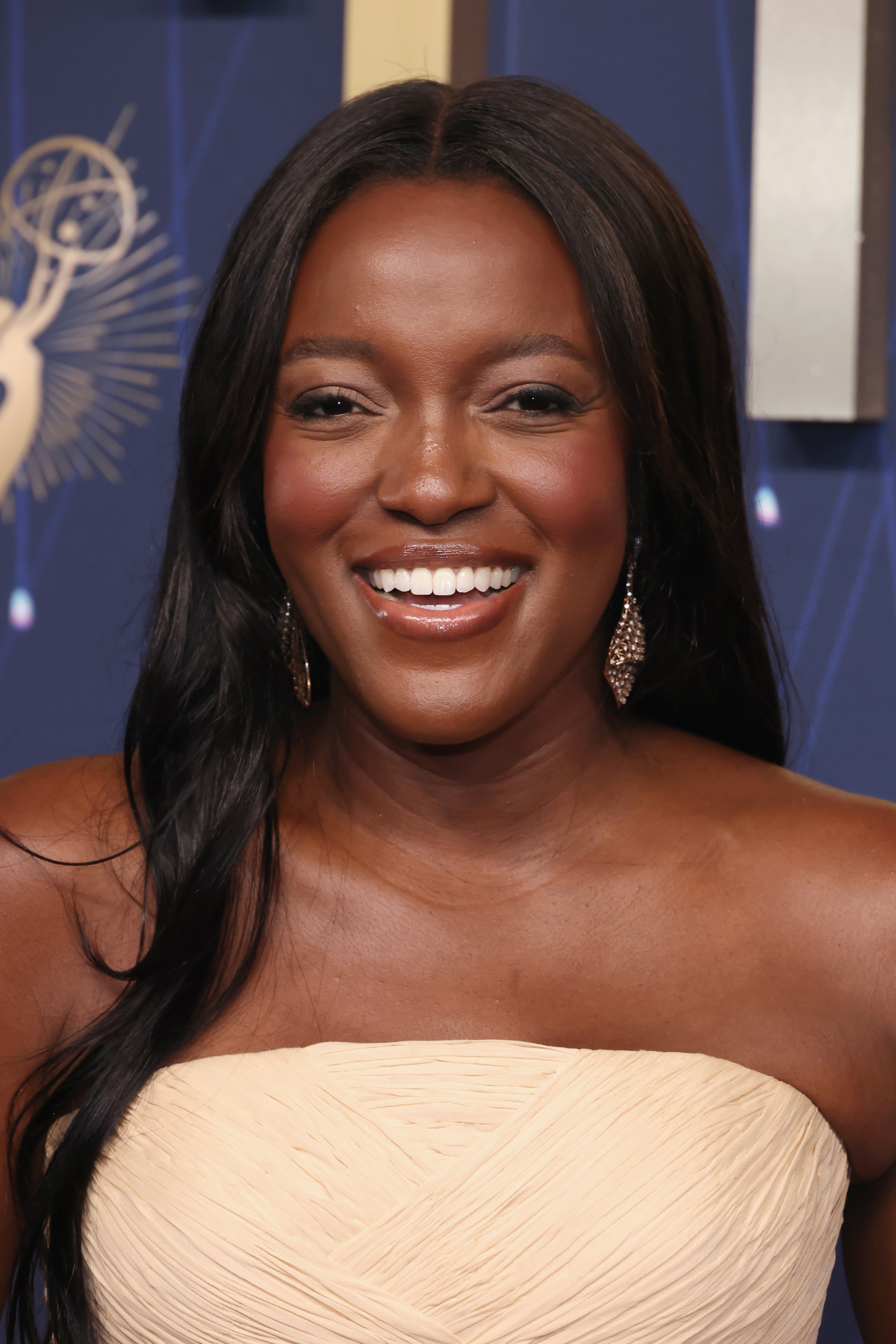 Krys Marshall attends the 77th Primetime Emmy Awards red carpet