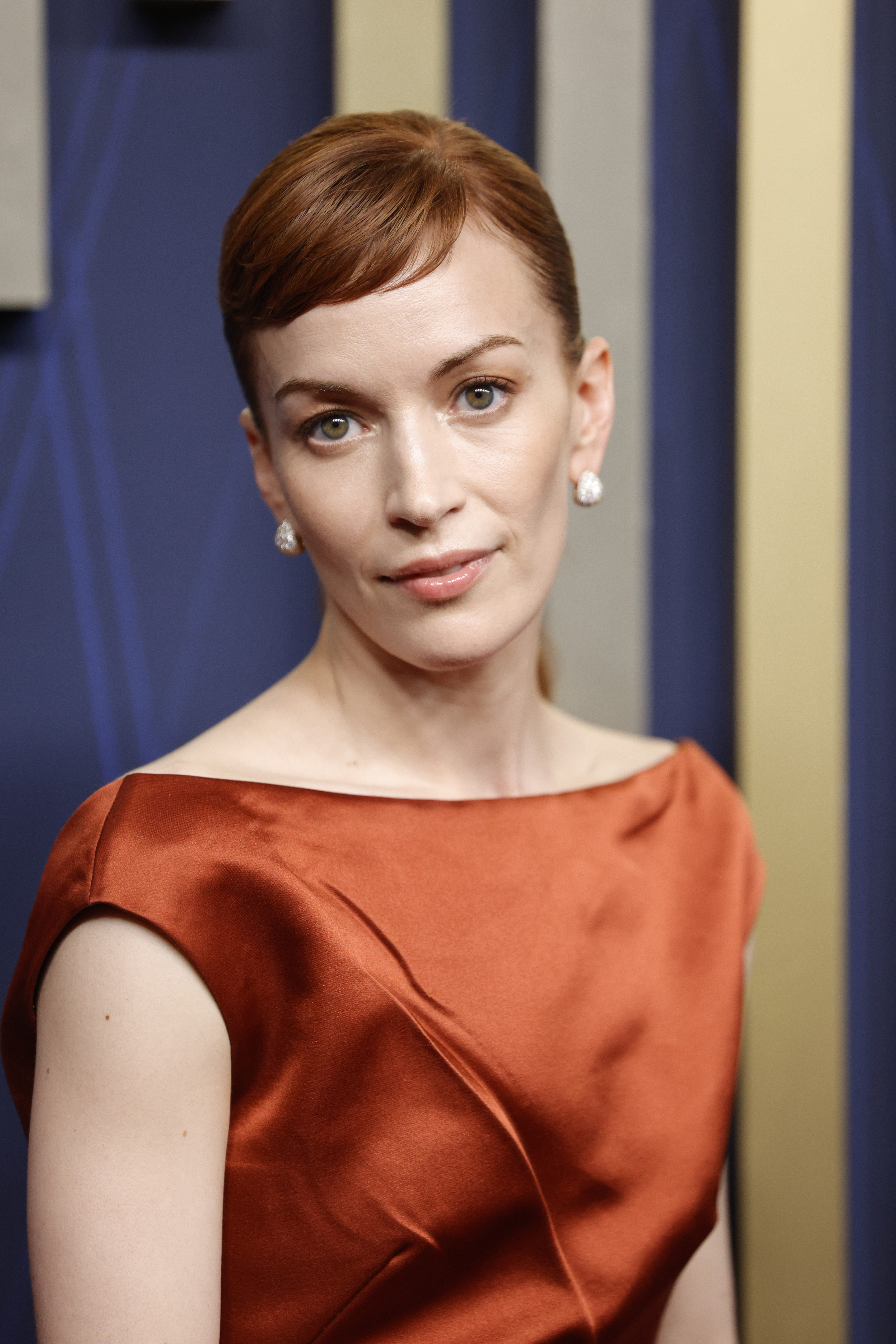 Britt Lower attends the 77th Primetime Emmy Awards red carpet