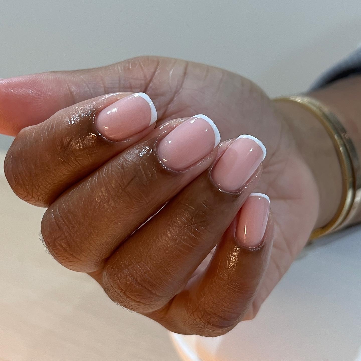 A classic, clean French manicure design