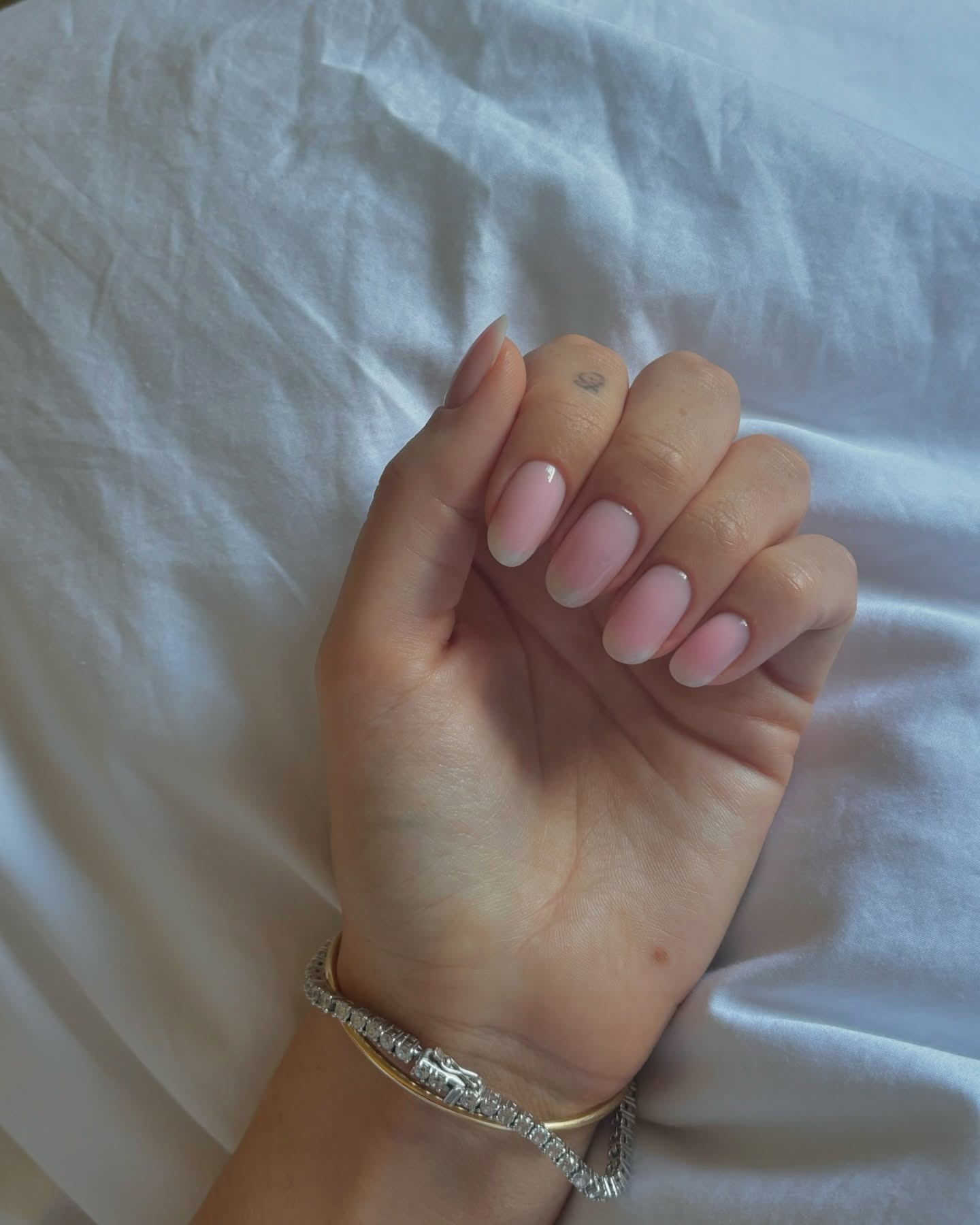 A picture of a blurred French manicure