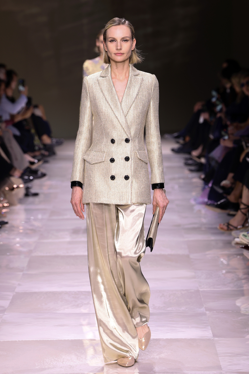 Model wearing a suit on the Armani Prive runway 2024