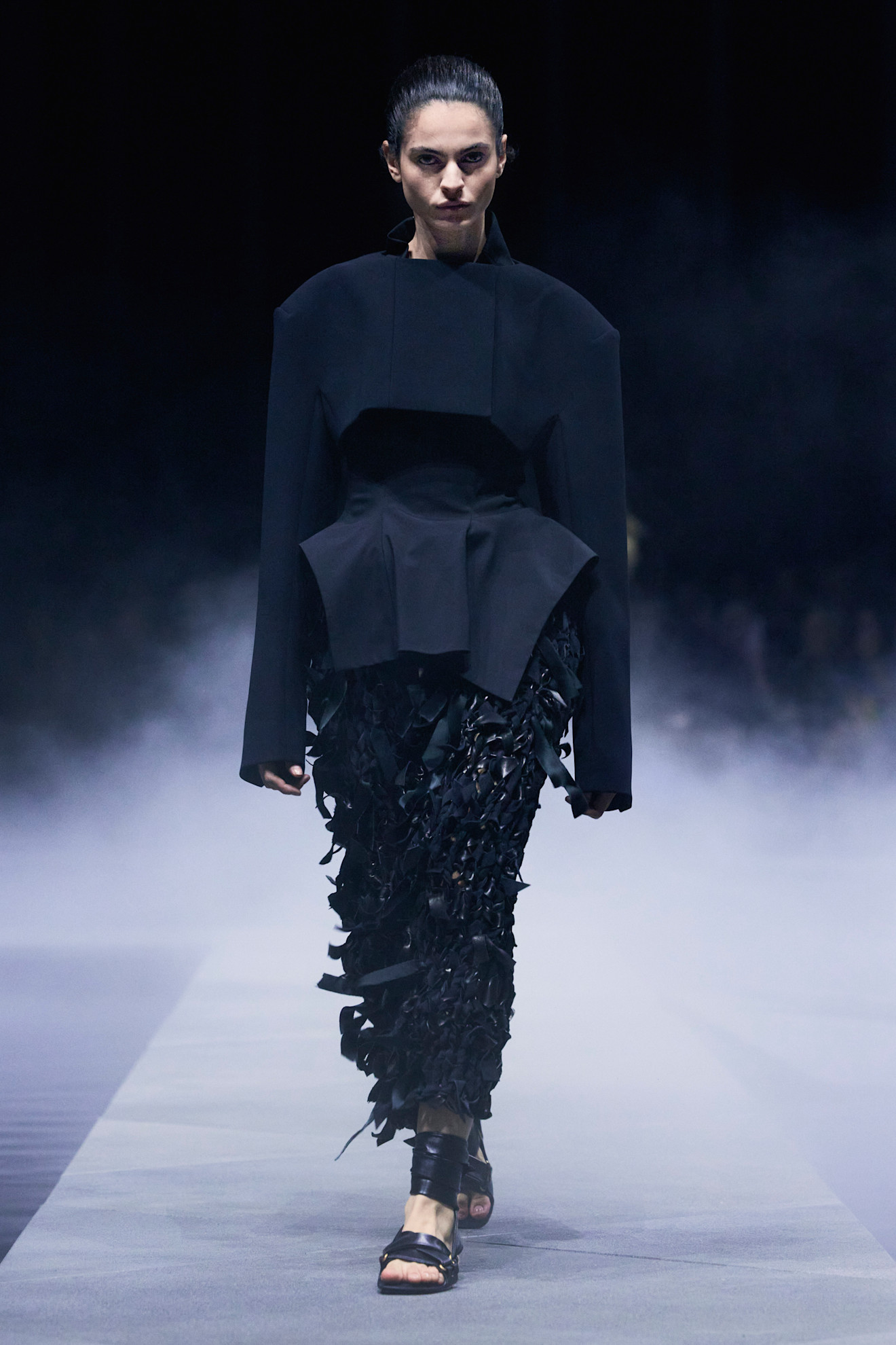 Khaite spring/summer 2026 exaggerated silhouettes on models.