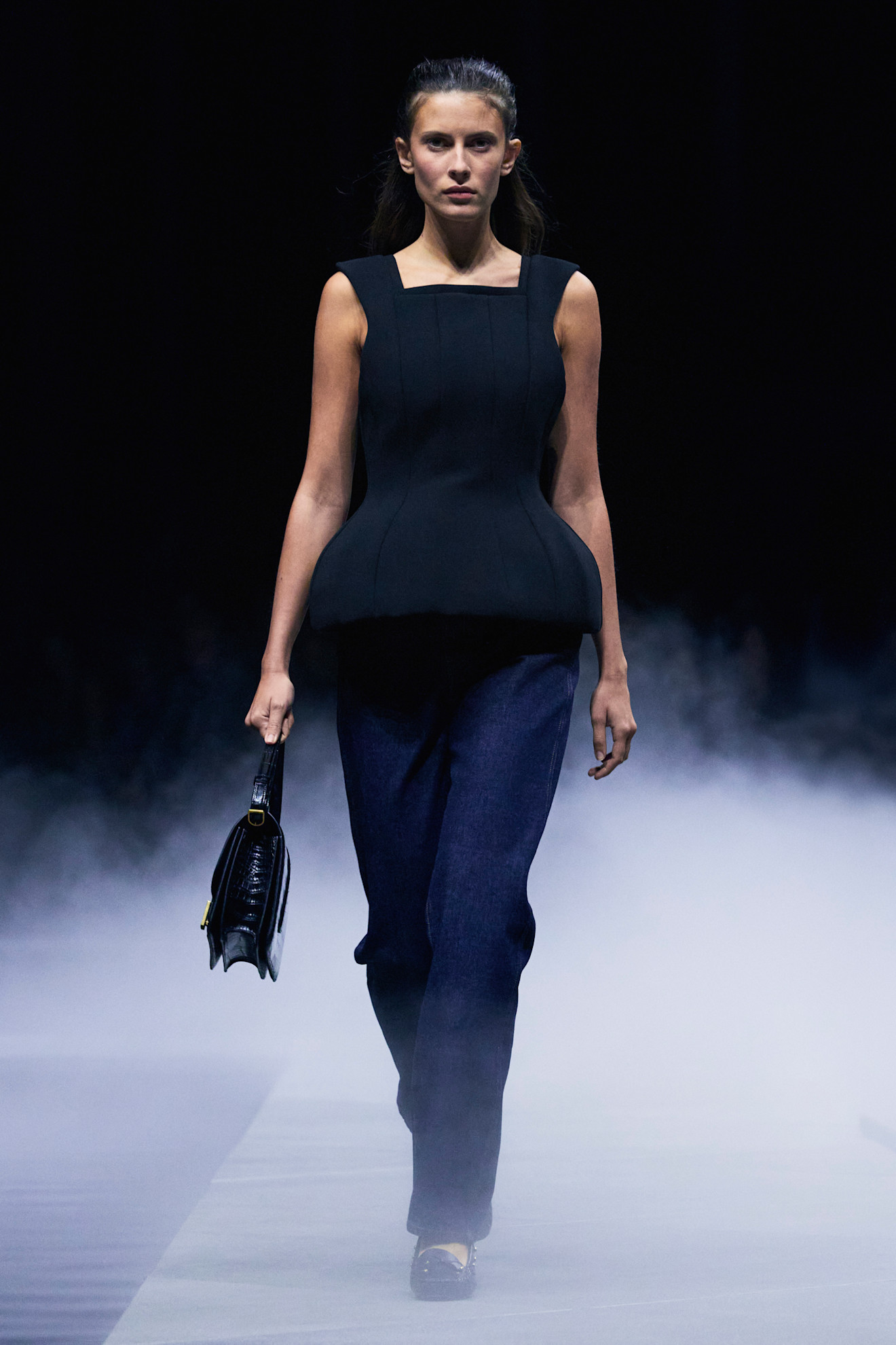 Khaite spring/summer 2026 exaggerated silhouettes on models.