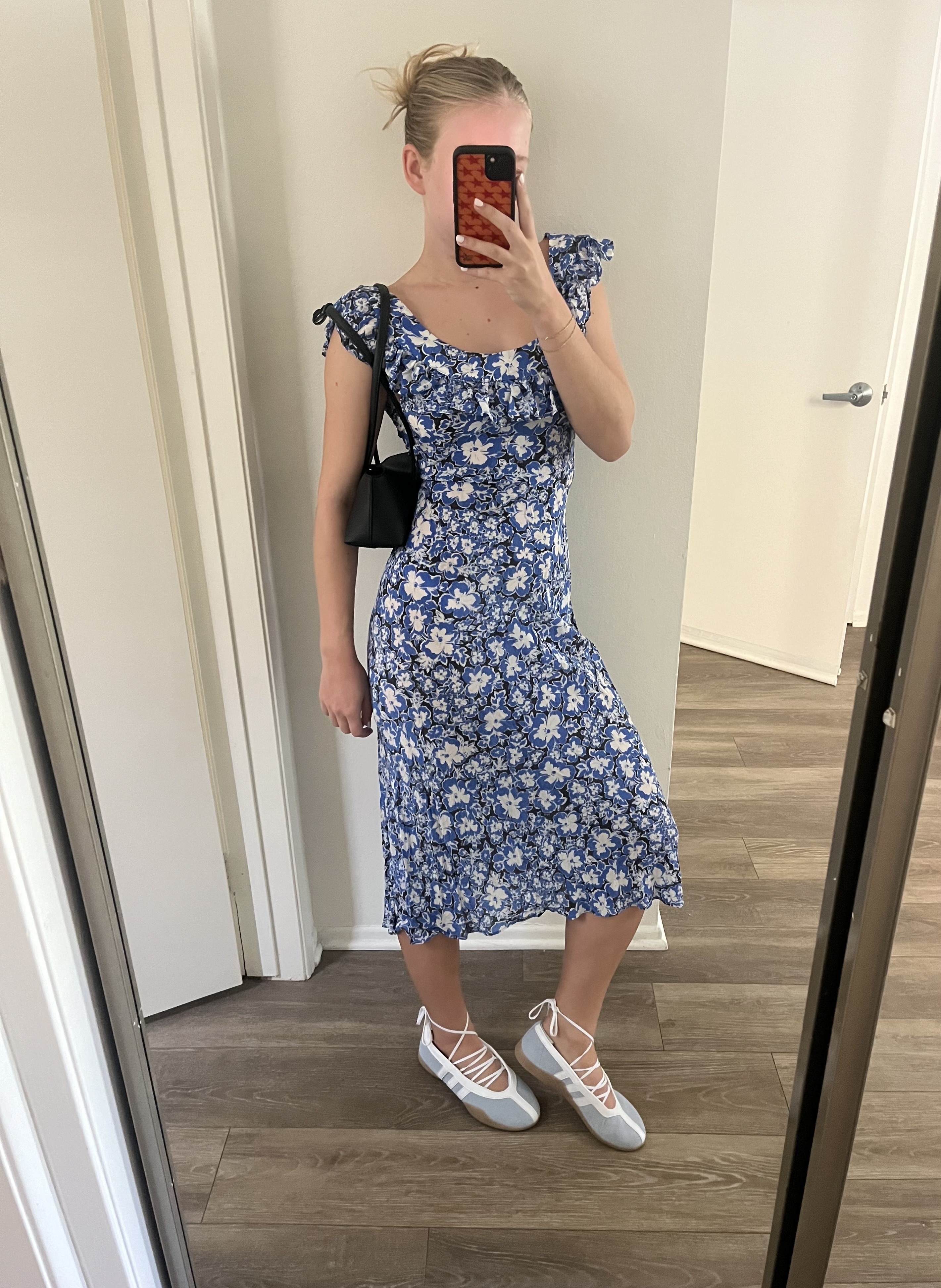 An editor wearing adidas sneakers.