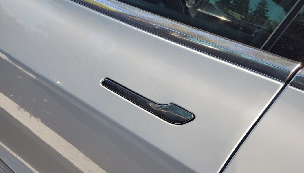 Tesla under investigation for door handles that trap people inside