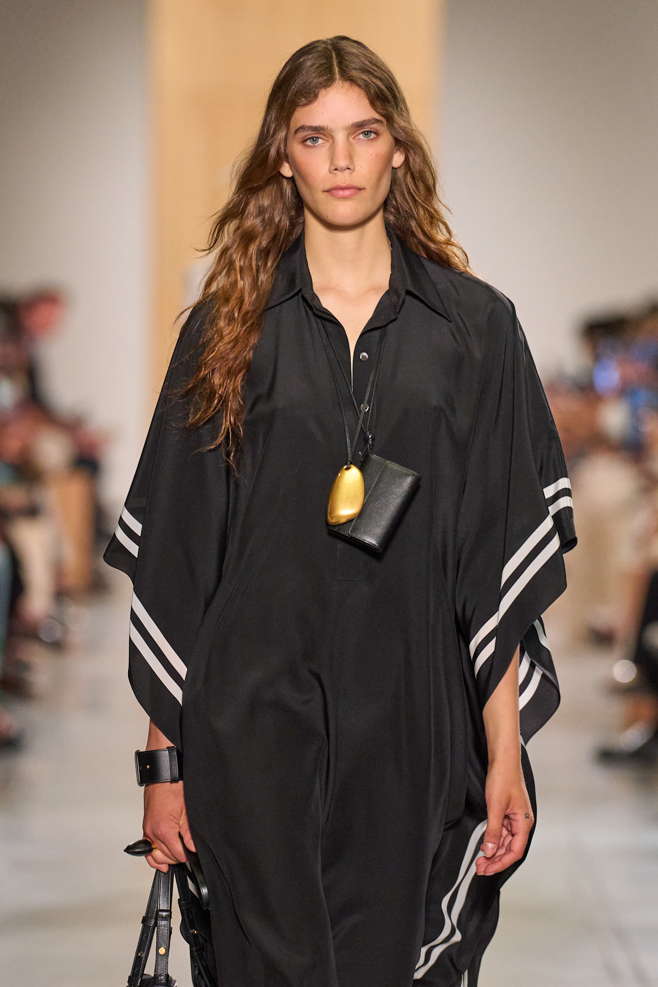 A model wearing a pendant necklace