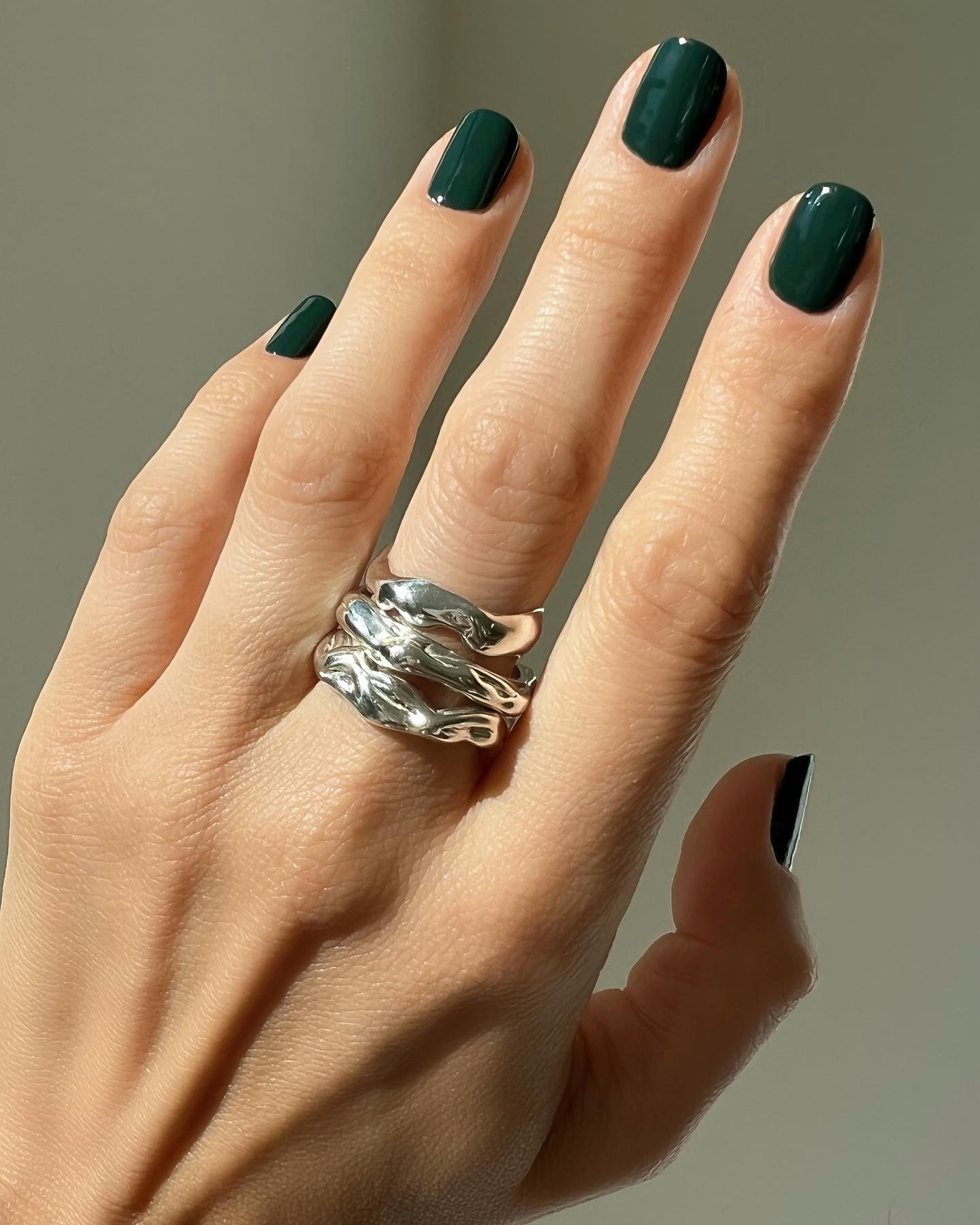 A forest green manicure by Betina Goldstein