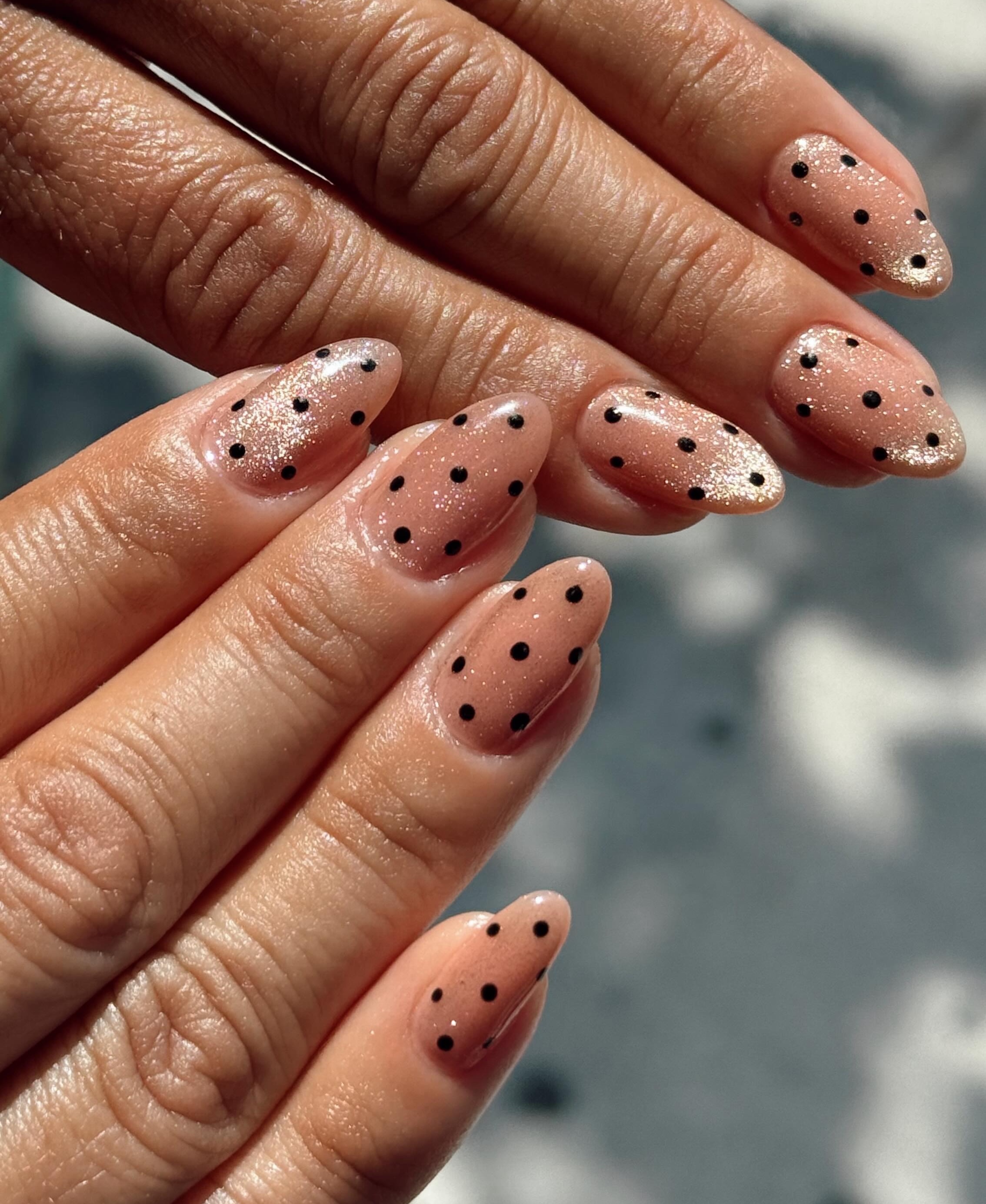 A velvet polka dot manicure by Quennie Nguyen