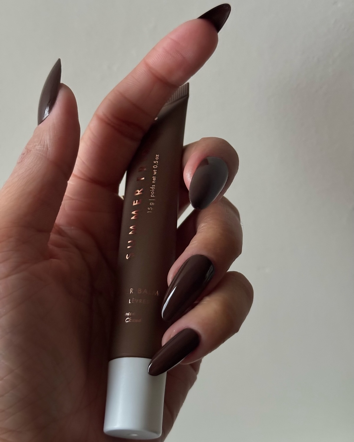 Long, almond-shaped brown nails