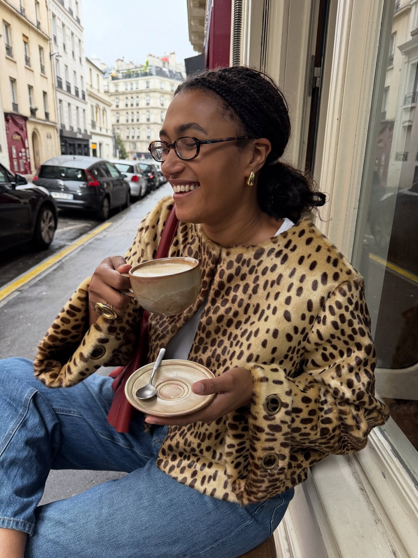 Fashion person Lena Farl wears the cropped leopard print coat trend.