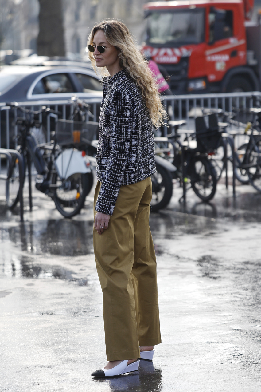 Woman wearing wedge shoes during spring/summer 2026 fashion week.