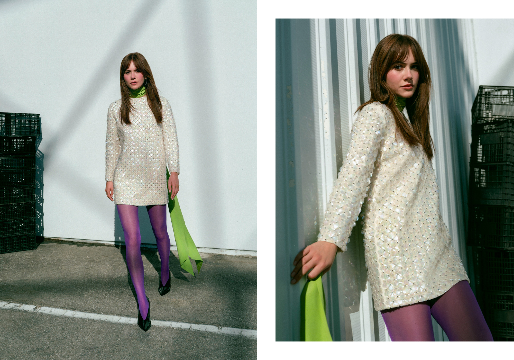 Emilia Jones for WWW&#039;s fall Ones to Watch portfolio. She is standing outside next to a stack of black crates wearing a white beaded minidress with a green neck scarf and purple tights.