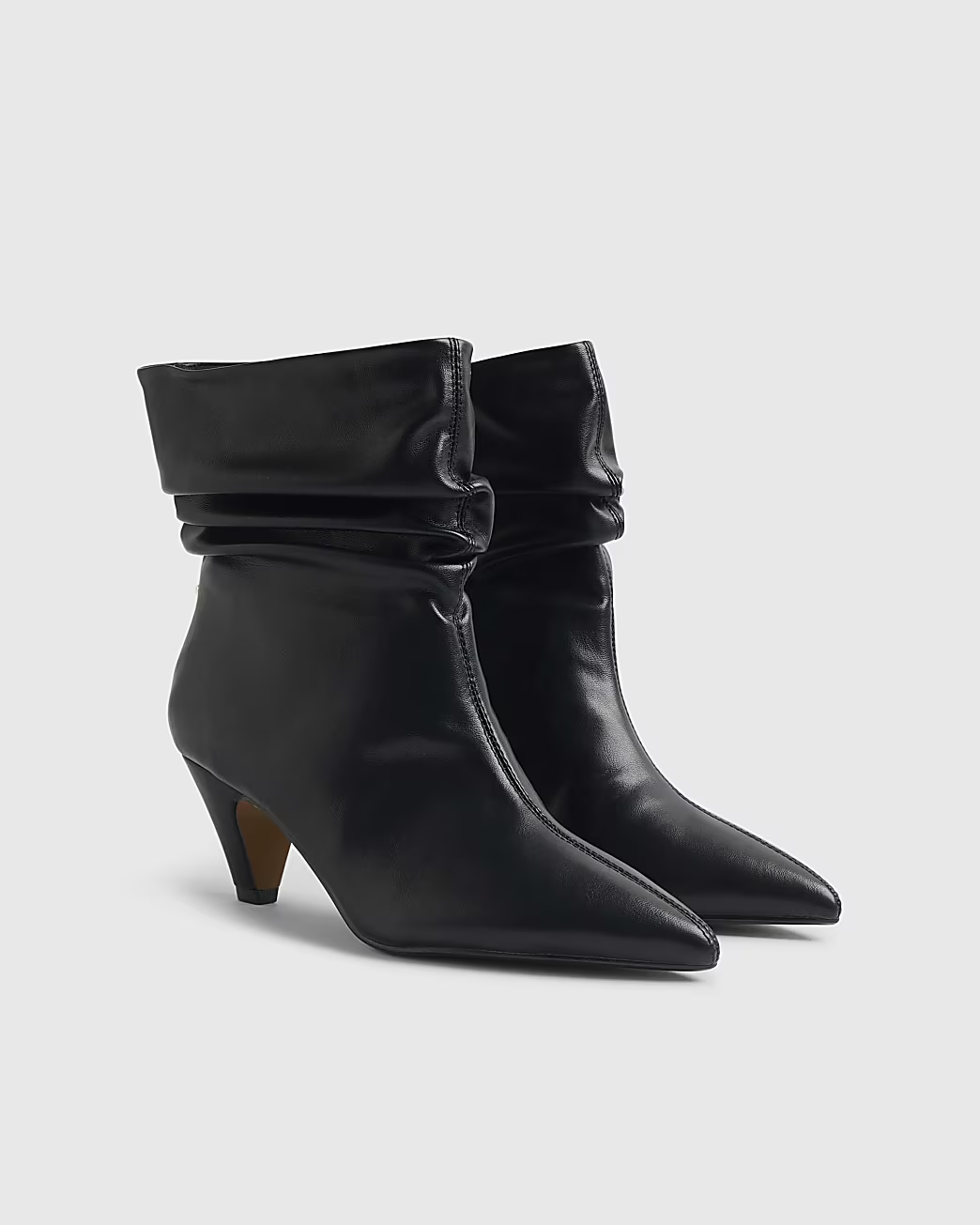 A pair of River Island black slouchy ankle boots