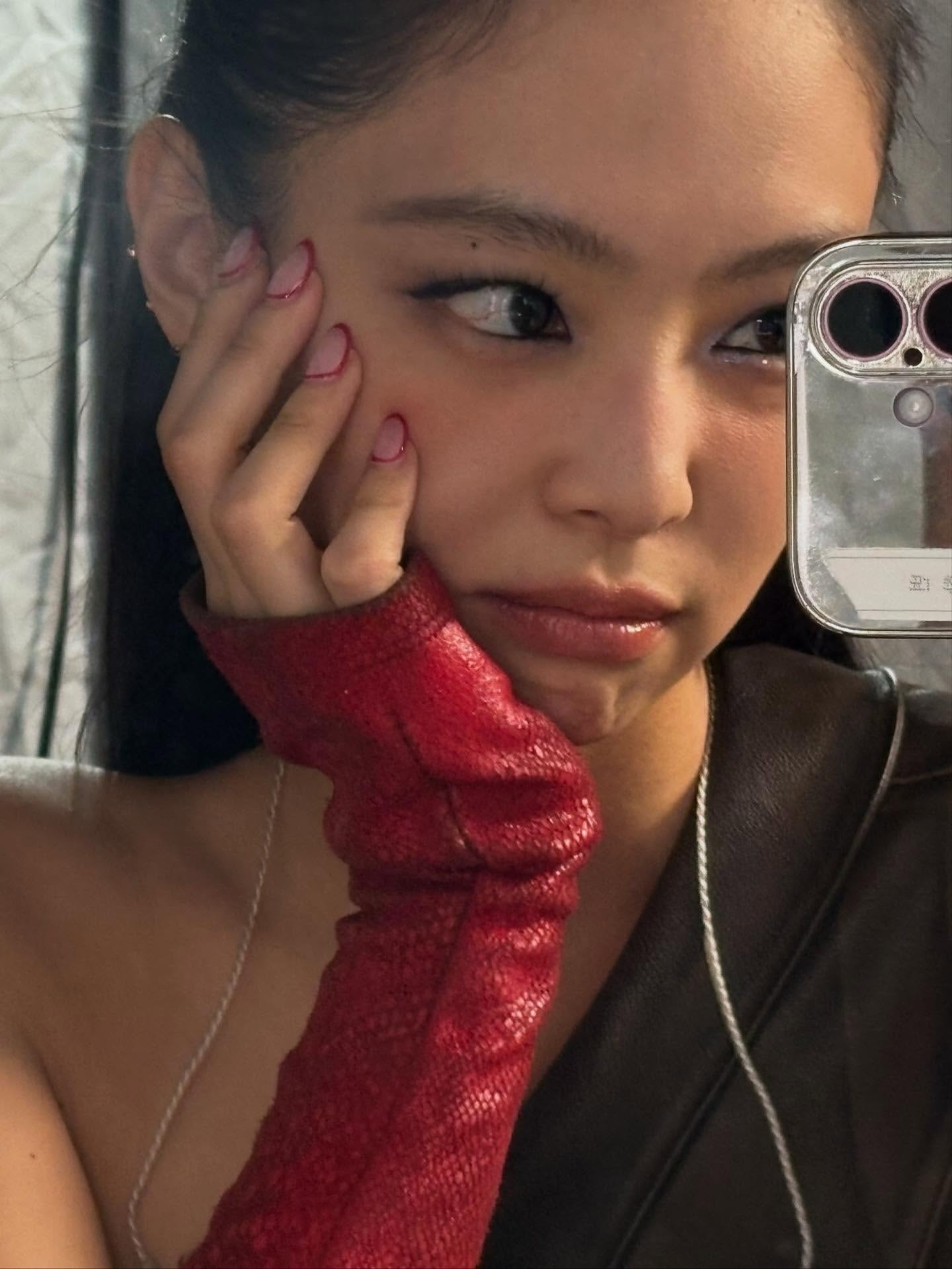 Photo of Jennie Kim with C-French nails