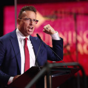 MAGA Influencer Benny Johnson Posts AI Video of Himself Dressed As Batman Assaulting Migrants
