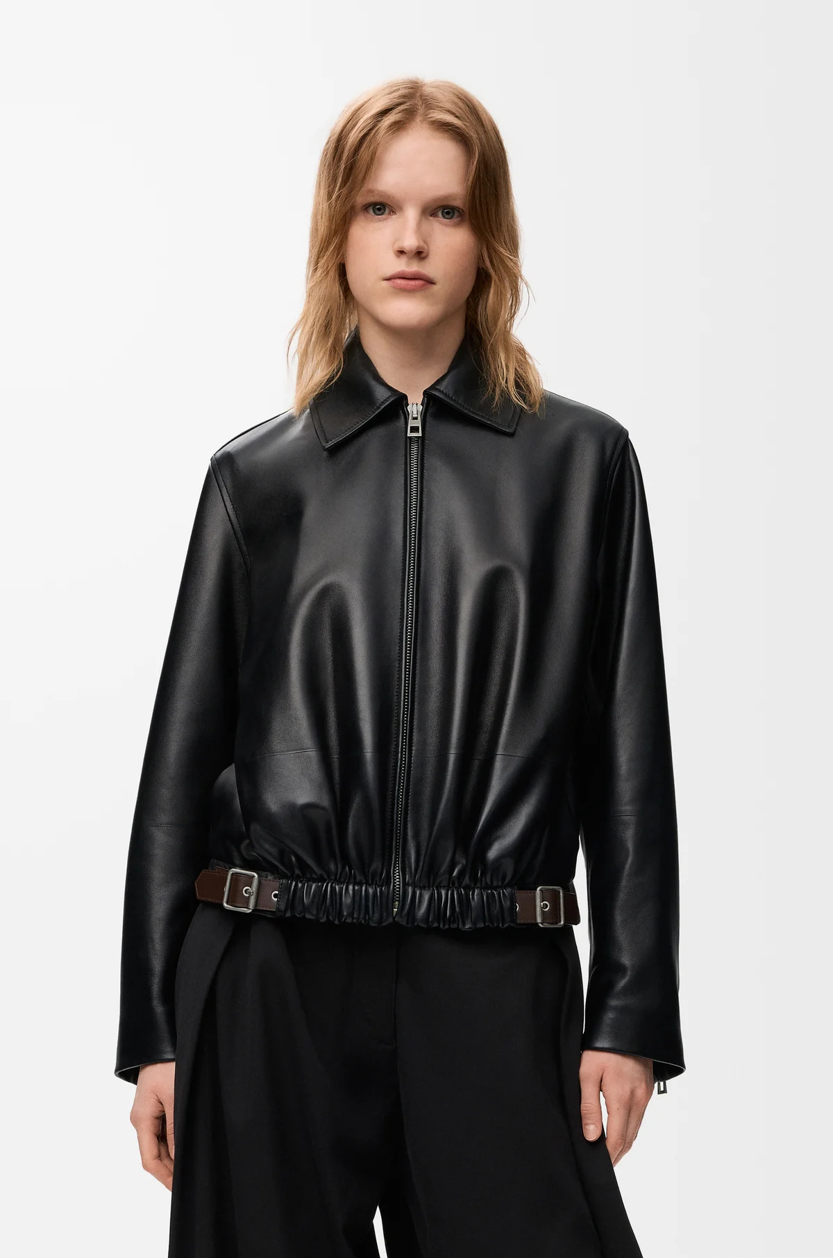 A model wears a Loewe bomber jacket