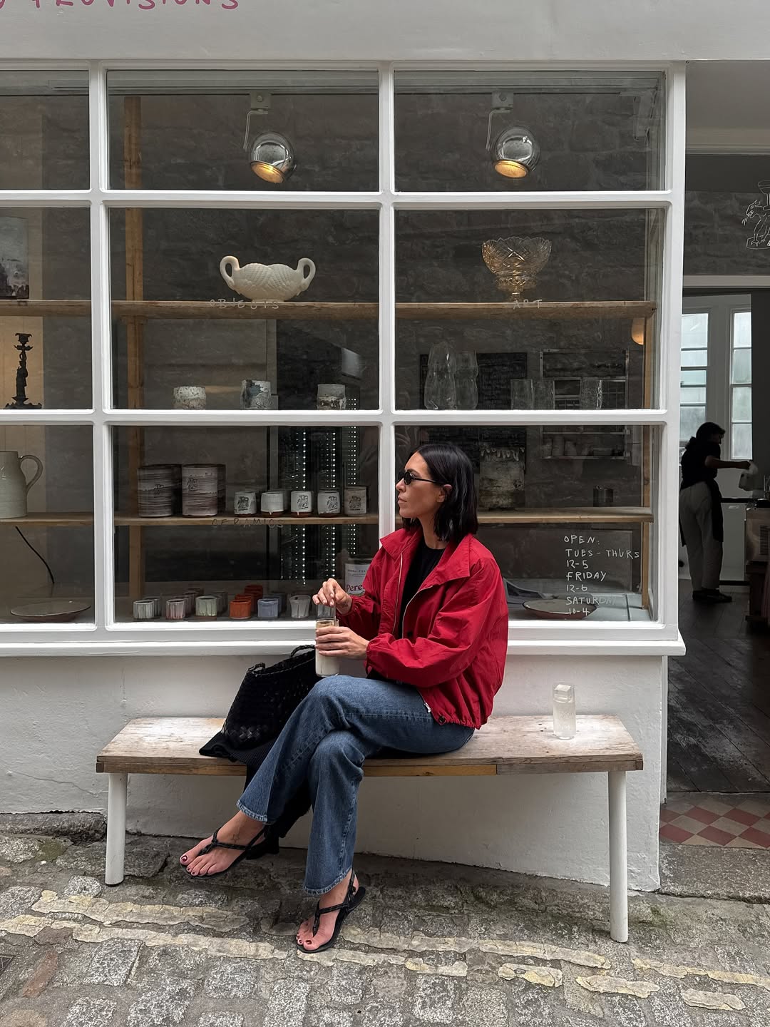 @_jessicaskye wearing a red jacket and jeans