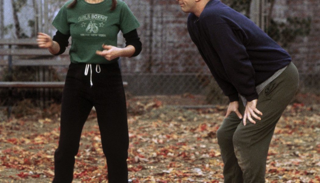 The 90's Layered T-Shirt Trend to Pair With Jeans in Winter