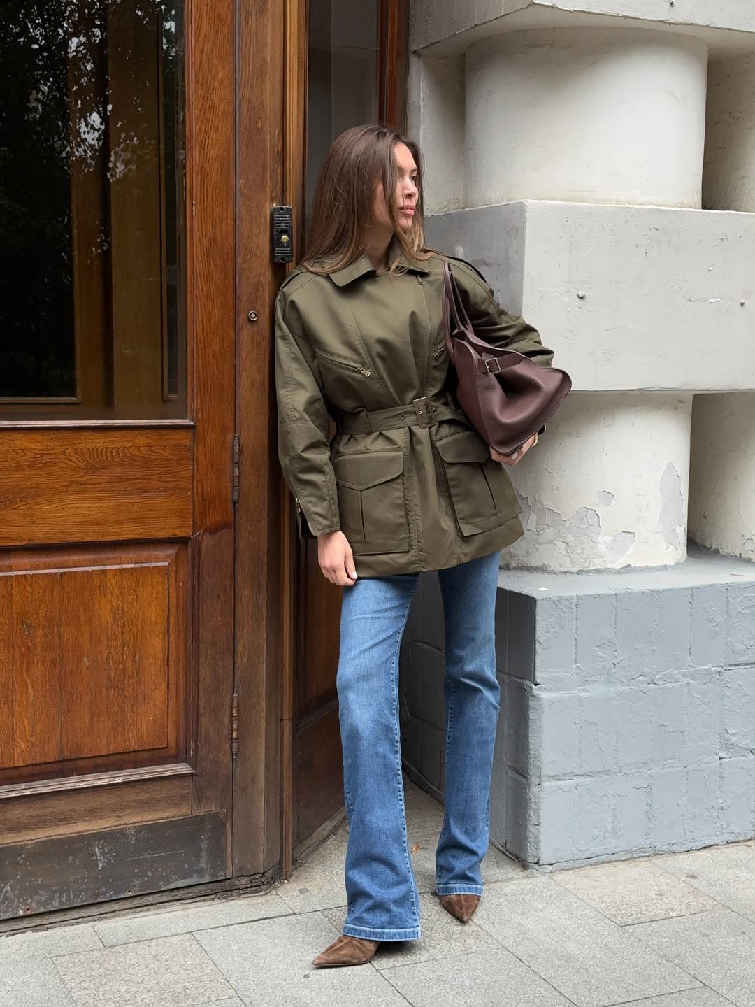 woman wearing fall denim skinny-ish jean trend 2025