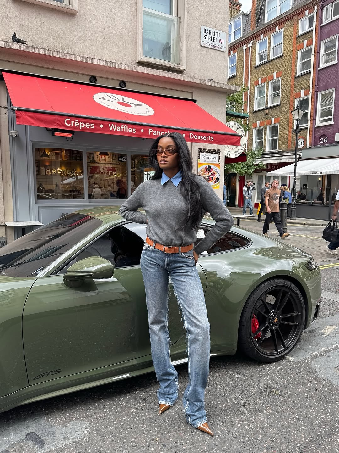 woman wearing jeans with leather belt fall 2025