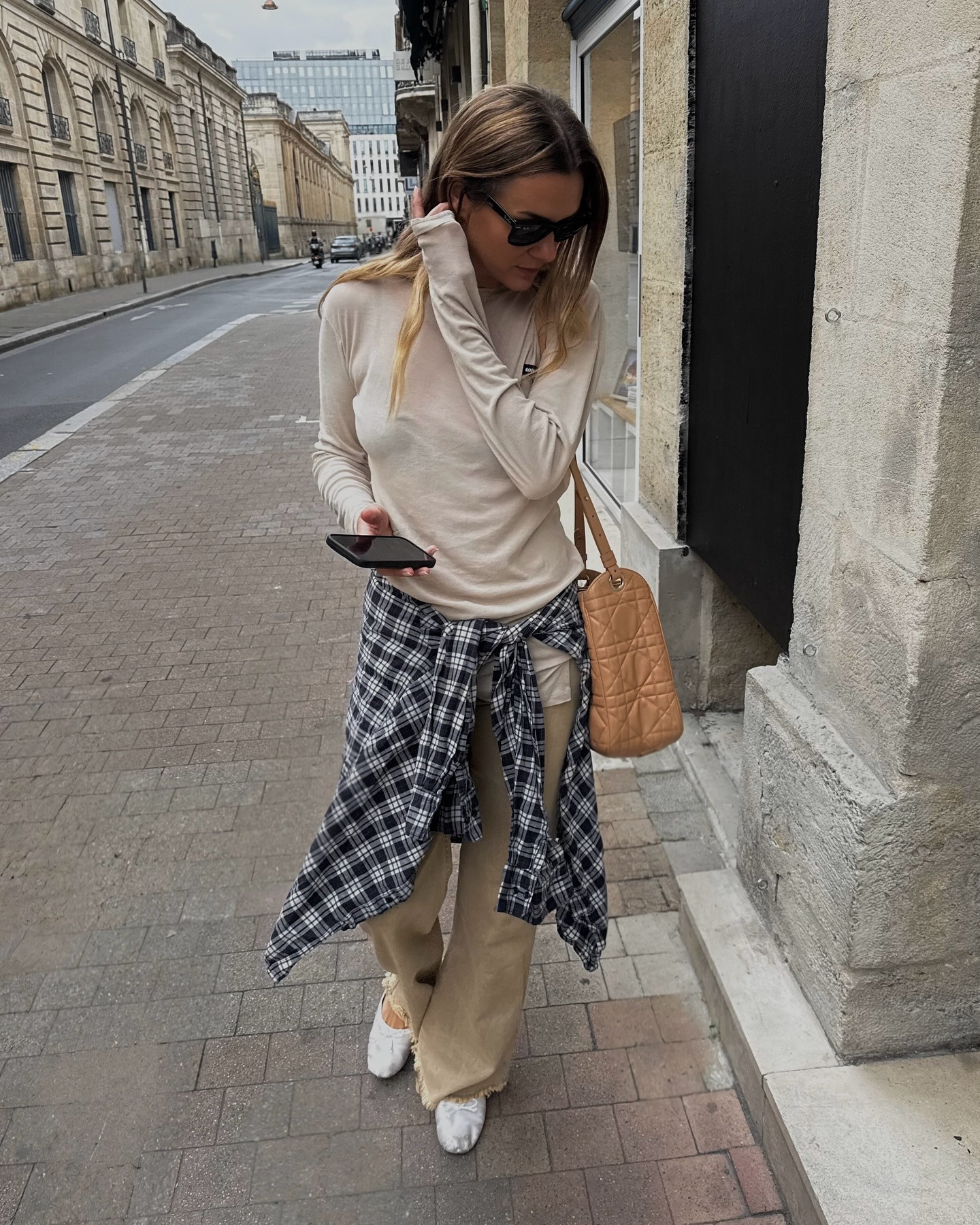 Influencer wearing oatmeal-colored clothing