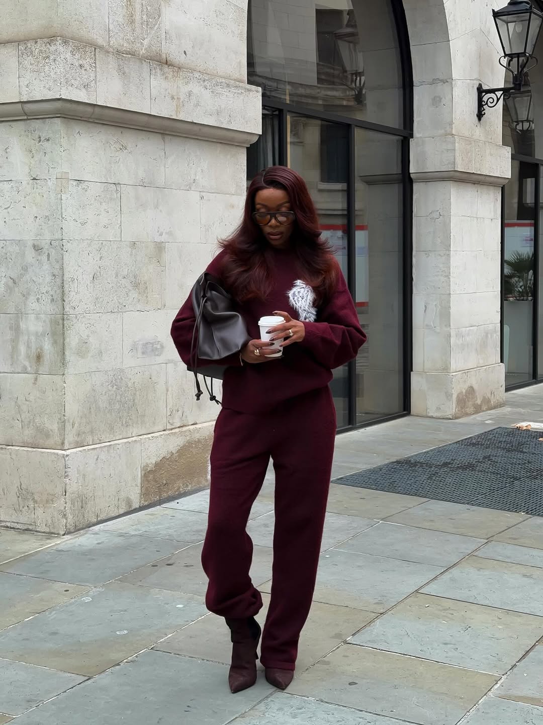 woman wearing suede pointed toe ankle boots trend 2025