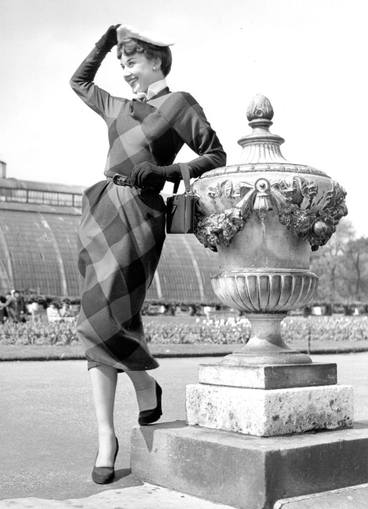 1st May 1950: Belgian born actress Audrey Hepburn (1929 - 1993) leaning on an ornate urn in Kew Gardens, London. Original Publication: Picture Post - 5035 - We Take A Girl To Look For Spring - pub. 1950 (Photo by Bert Hardy/Picture Post/Hulton Archive/Getty Images)