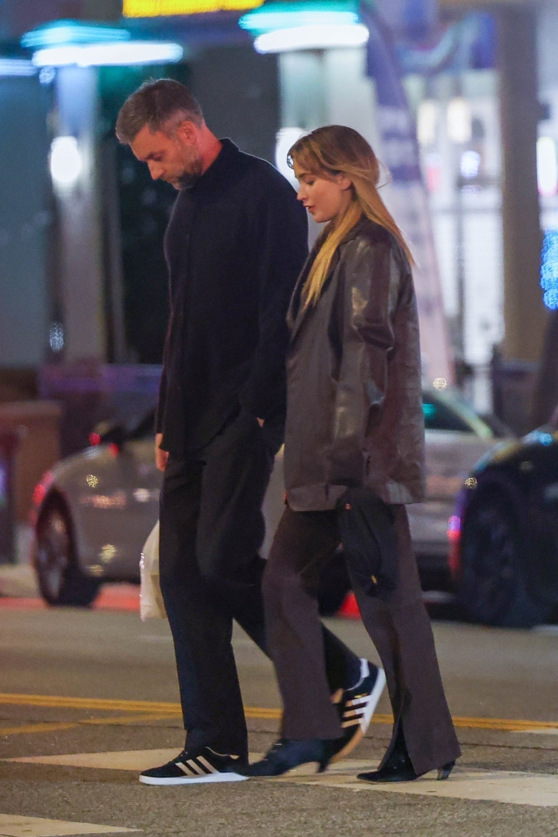 Actress Jennifer Lawrence sports a sleek all brown ensemble while stepping out for dinner with her husband Cooke Maroney in Los Angeles.