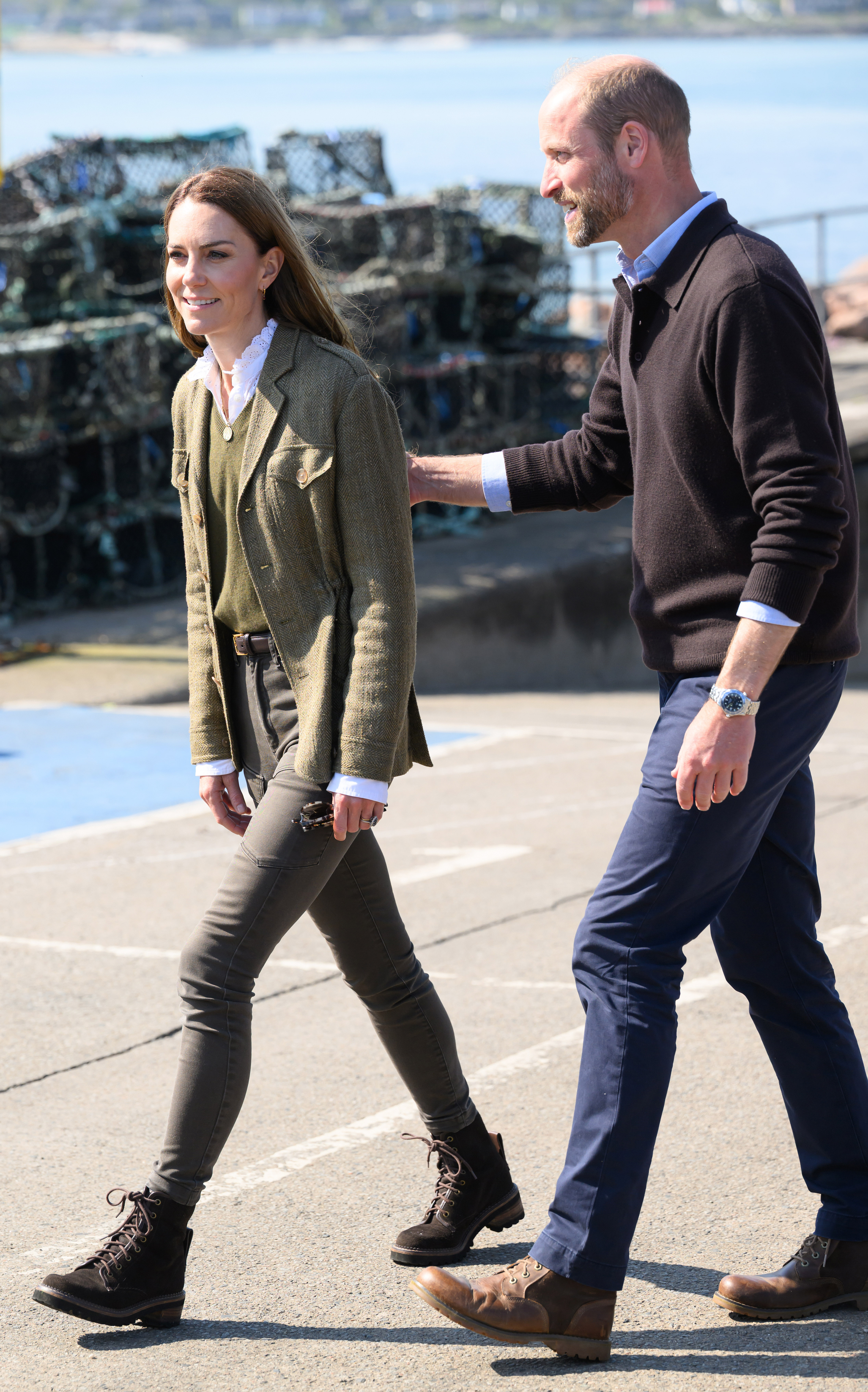 Kate Middleton wears skinny jeans and boots with a jacket