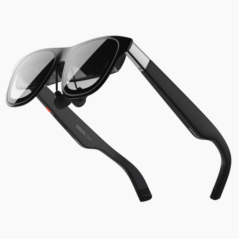 Xreal One AR glasses on a white background.