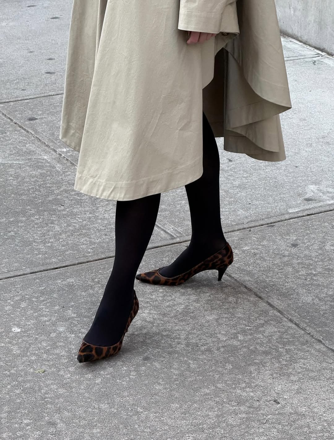 Christie Tyler wearing pony hair leopard print kitten heels