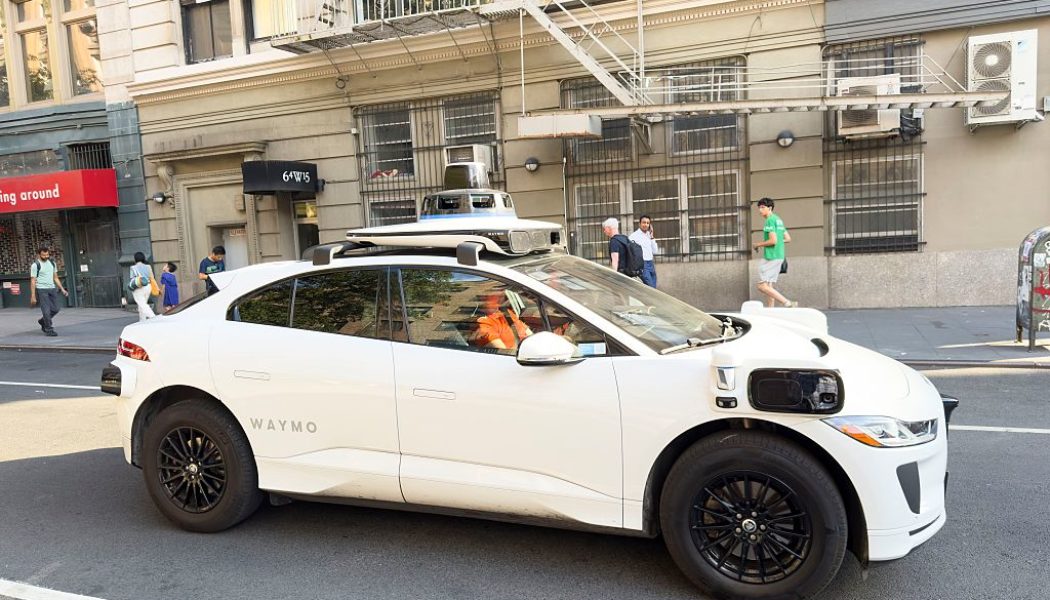 Driverless Waymo Vehicle Cruises Through Tense Police Situation In L.A. With Passenger Inside