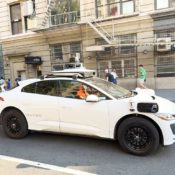 Driverless Waymo Vehicle Cruises Through Tense Police Situation In L.A. With Passenger Inside