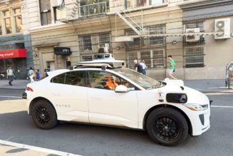 Driverless Waymo Vehicle Cruises Through Tense Police Situation In L.A. With Passenger Inside