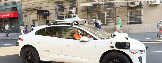 Driverless Waymo Vehicle Cruises Through Tense Police Situation In L.A. With Passenger Inside