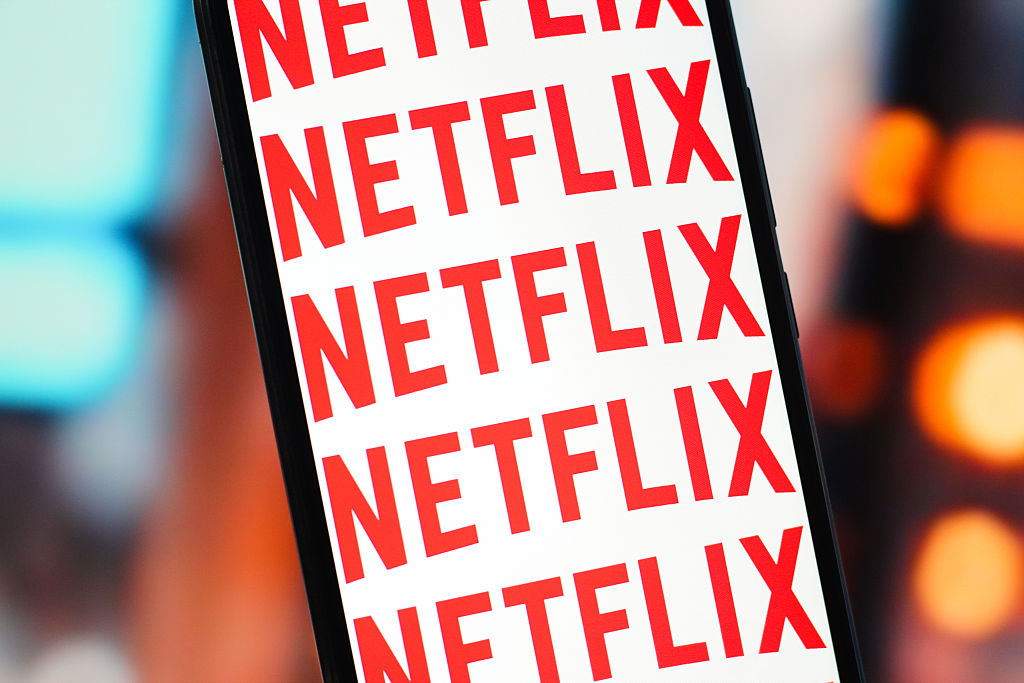 In this photo illustration, the Netflix logo is seen...
