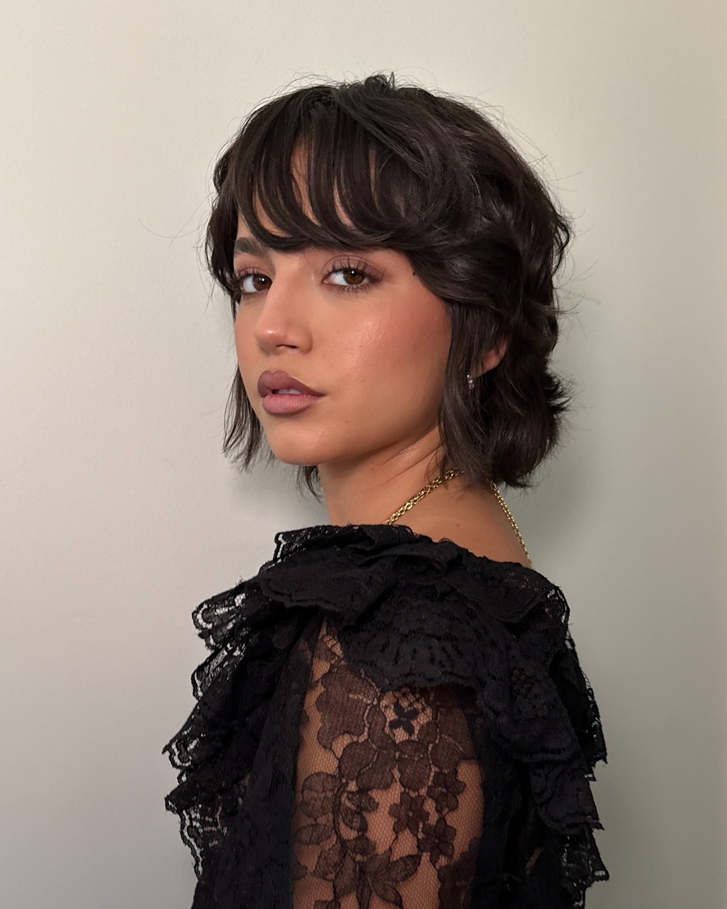 Isabela Merced with grown out crop hair cut
