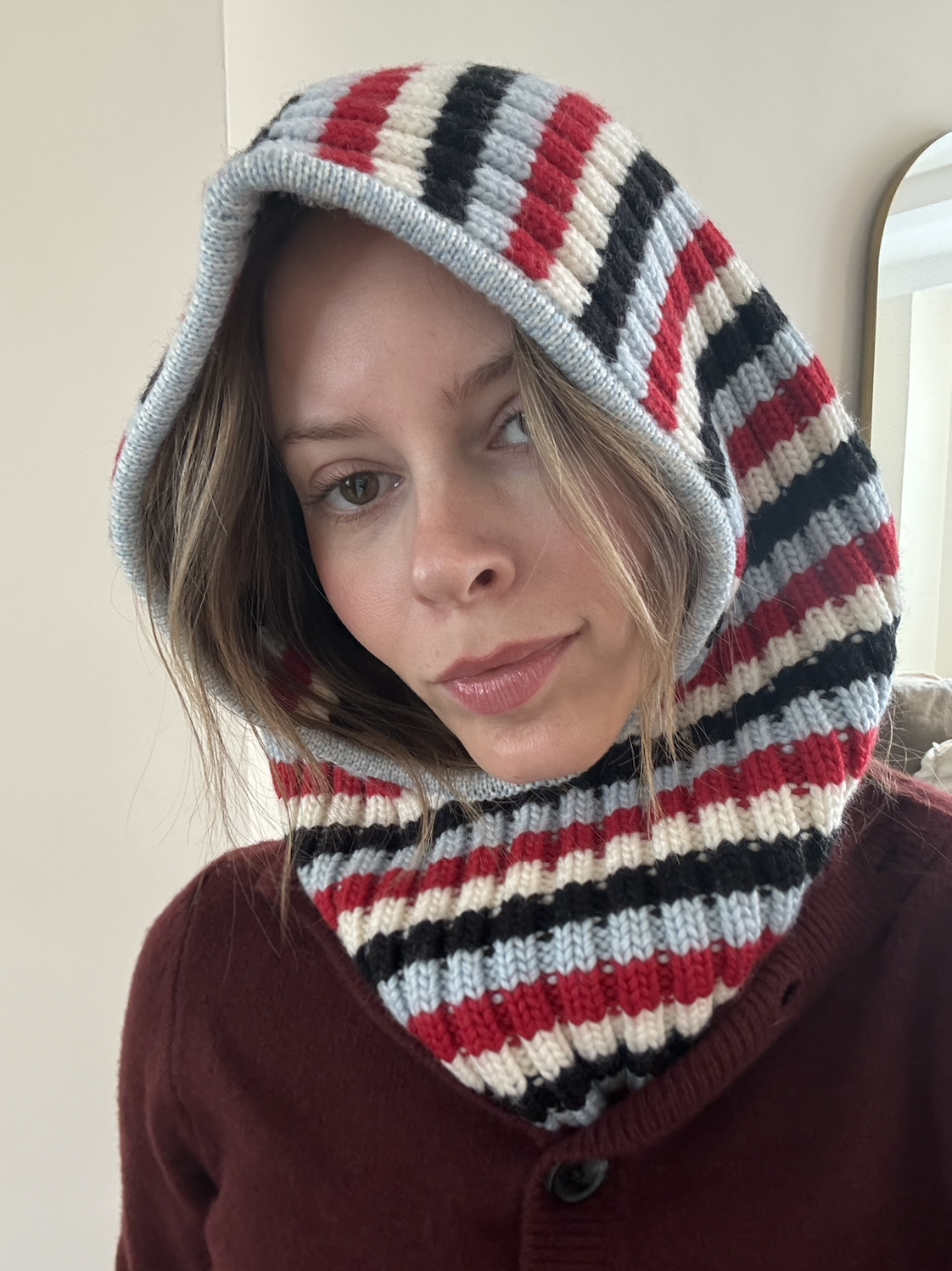 Nikki wears the balacava from the collab.