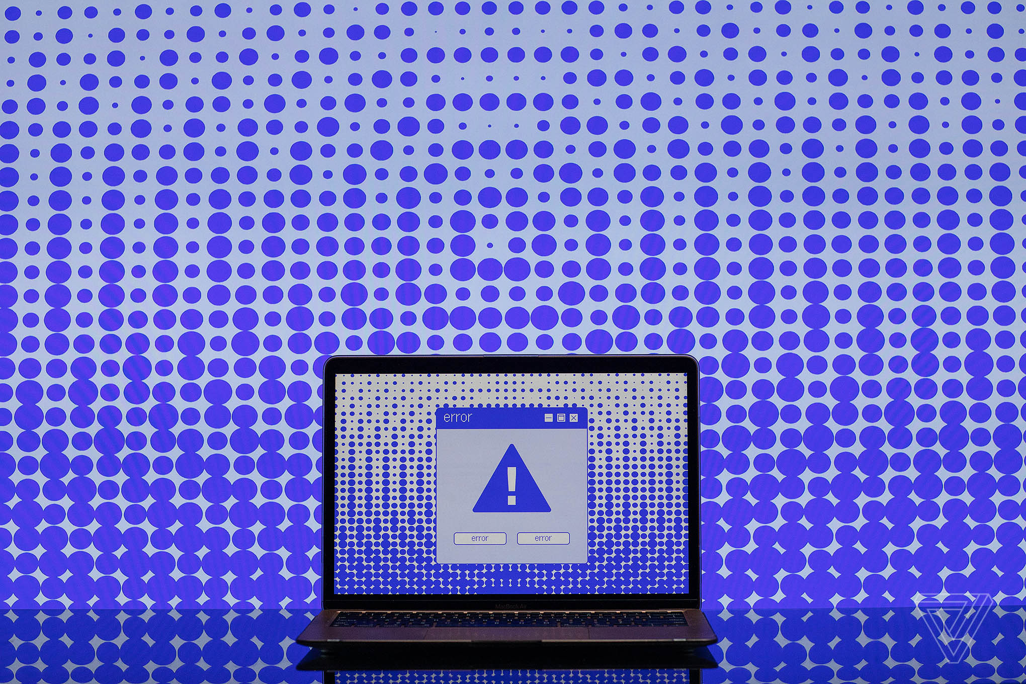 Illustration of a computer screen with a blue exclamation point on it and an error box.