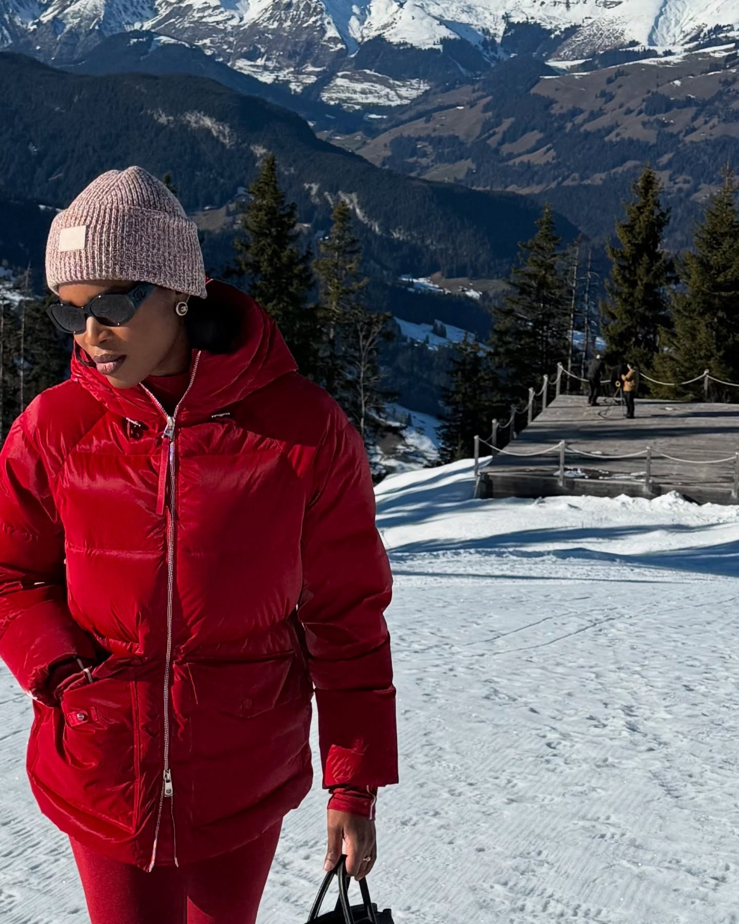 Marilyn NK wears a women's red ski outfit.