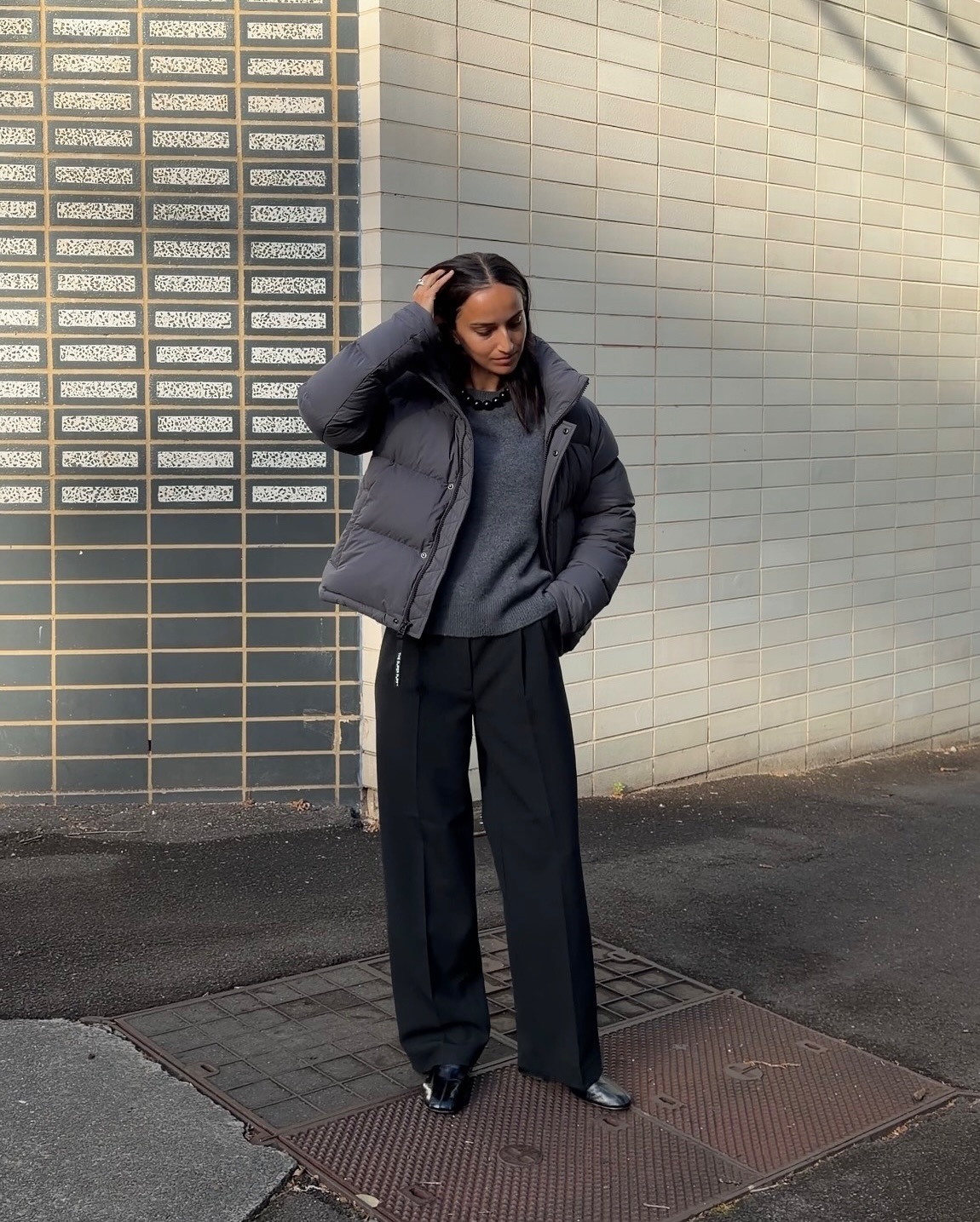 @bellathomas wears an Aritzia SuperPuff