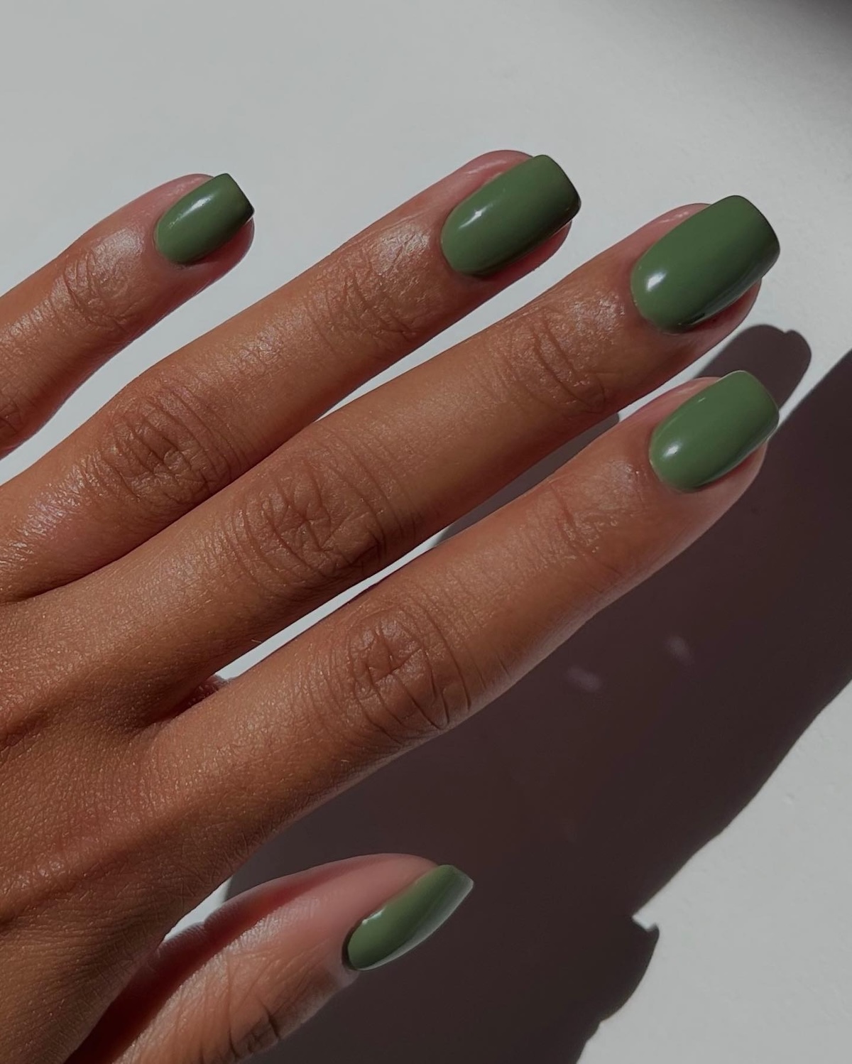 Olive-colored nails
