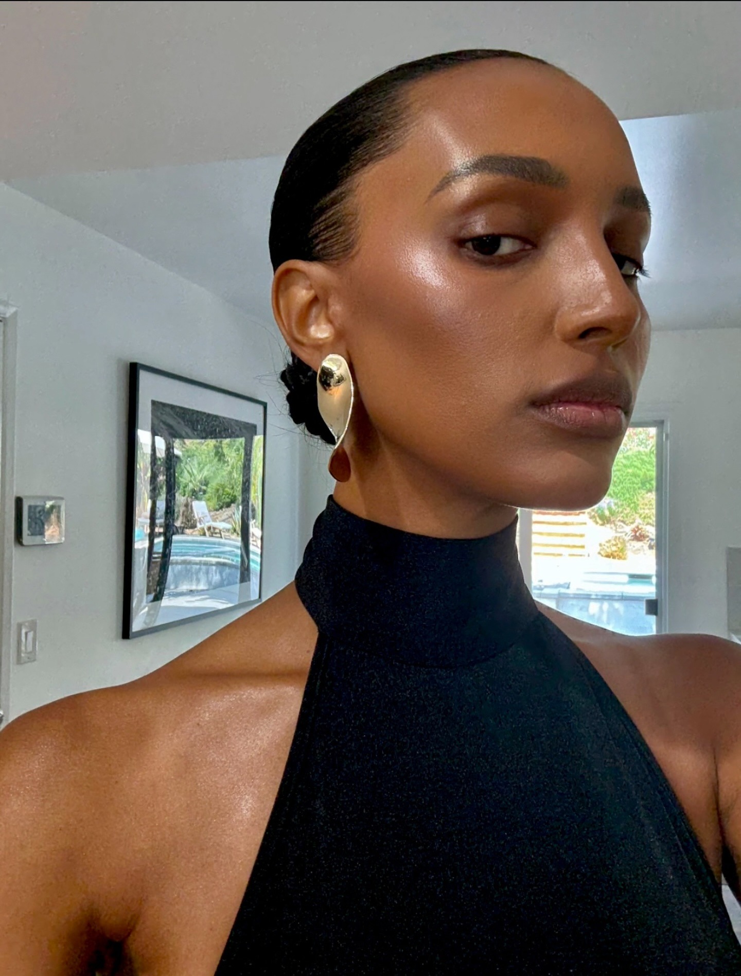 Jasmine Tookes with glowy skin.
