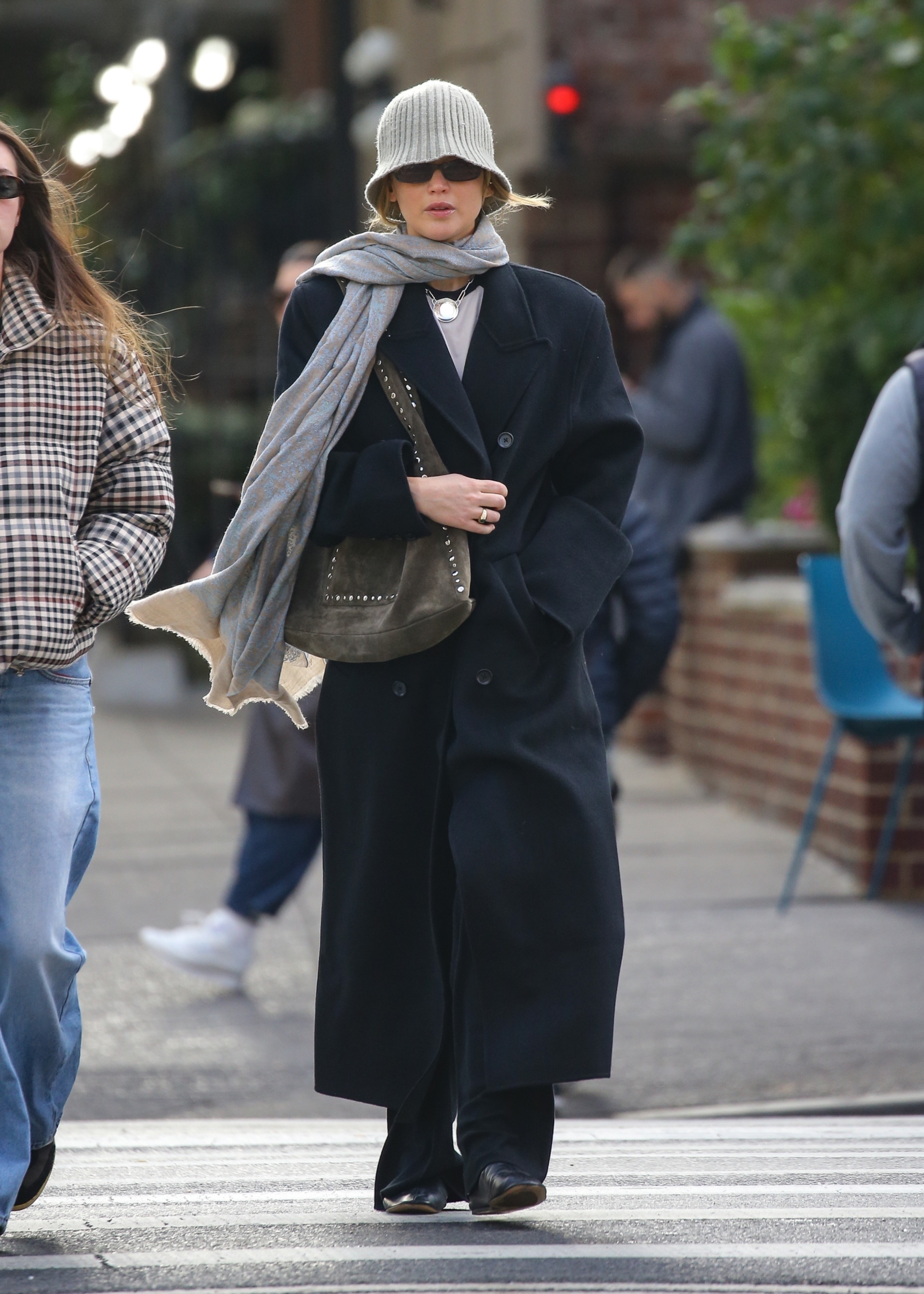 Jennifer Lawrence in black drawstring pants