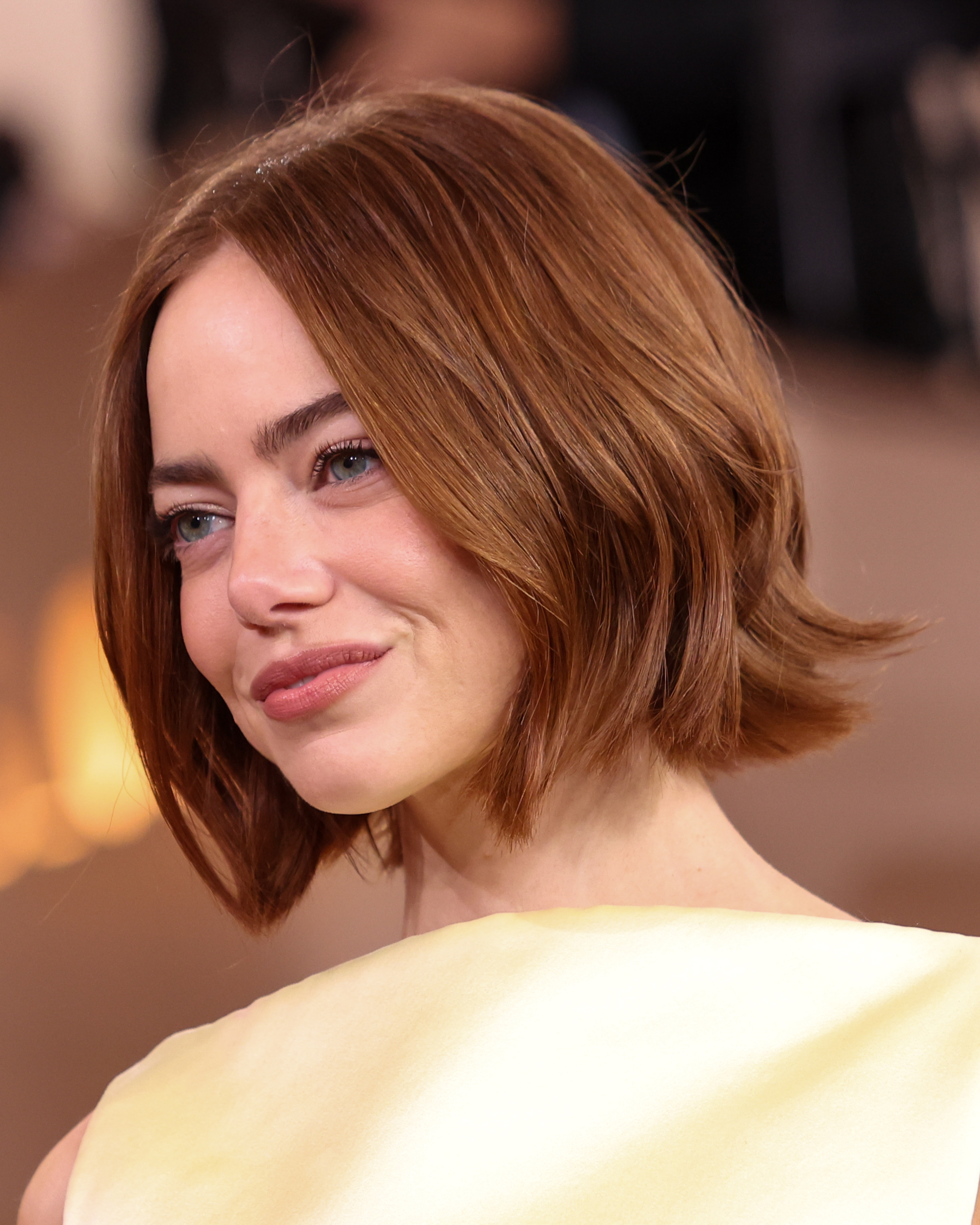 Emma Stone with a choppy bob at the 83rd Annual Golden Globes.