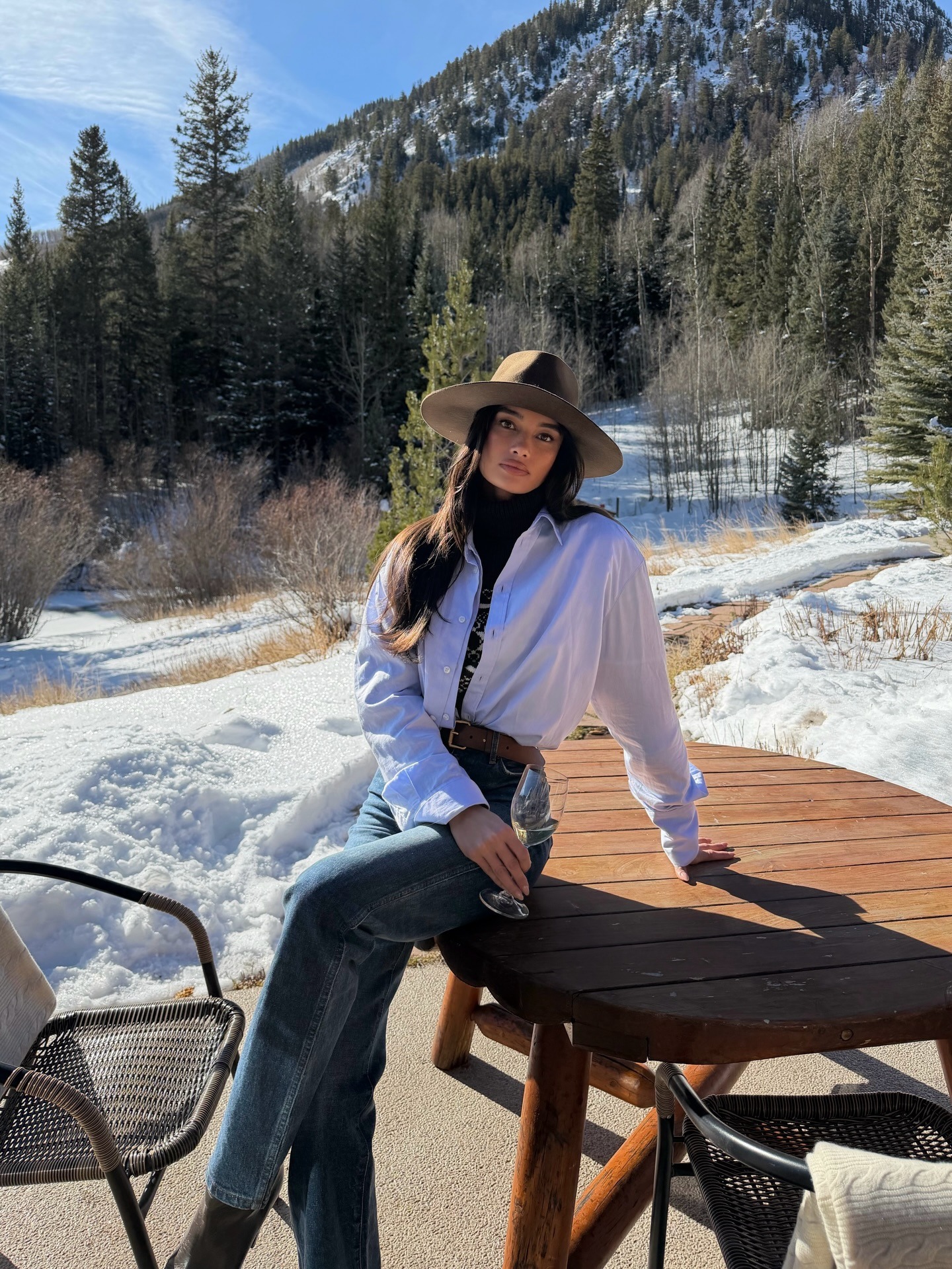 Woman wearing a Ralph tuck outfit.